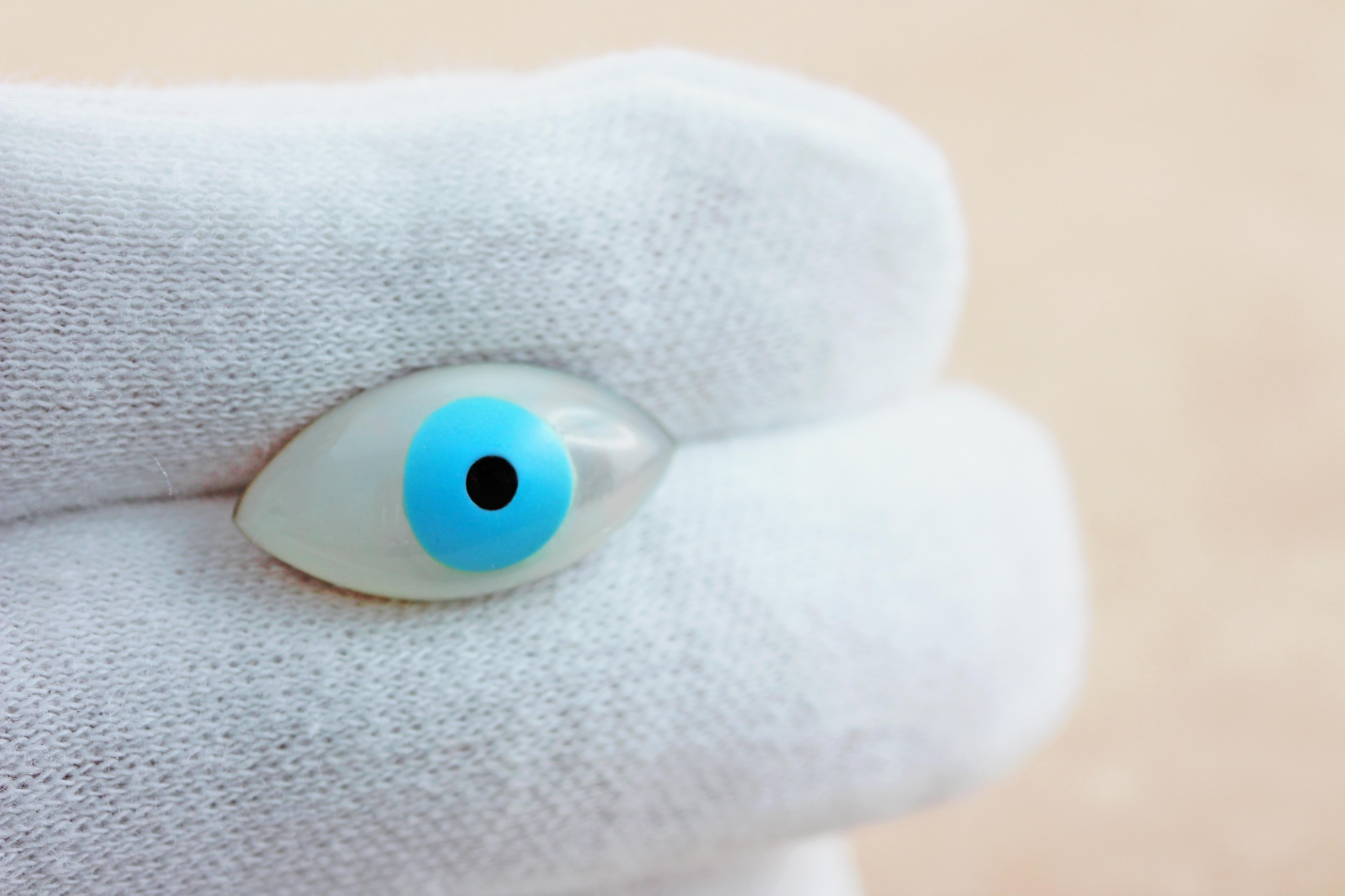 The myth of the evil eye has intrigued people for thousands of years! 
Believed the bring the wearer good luck, these cufflinks are made in rose gold and the eye is made in mother of pearl with turquoise inlay, reminiscent of the Greek sea and