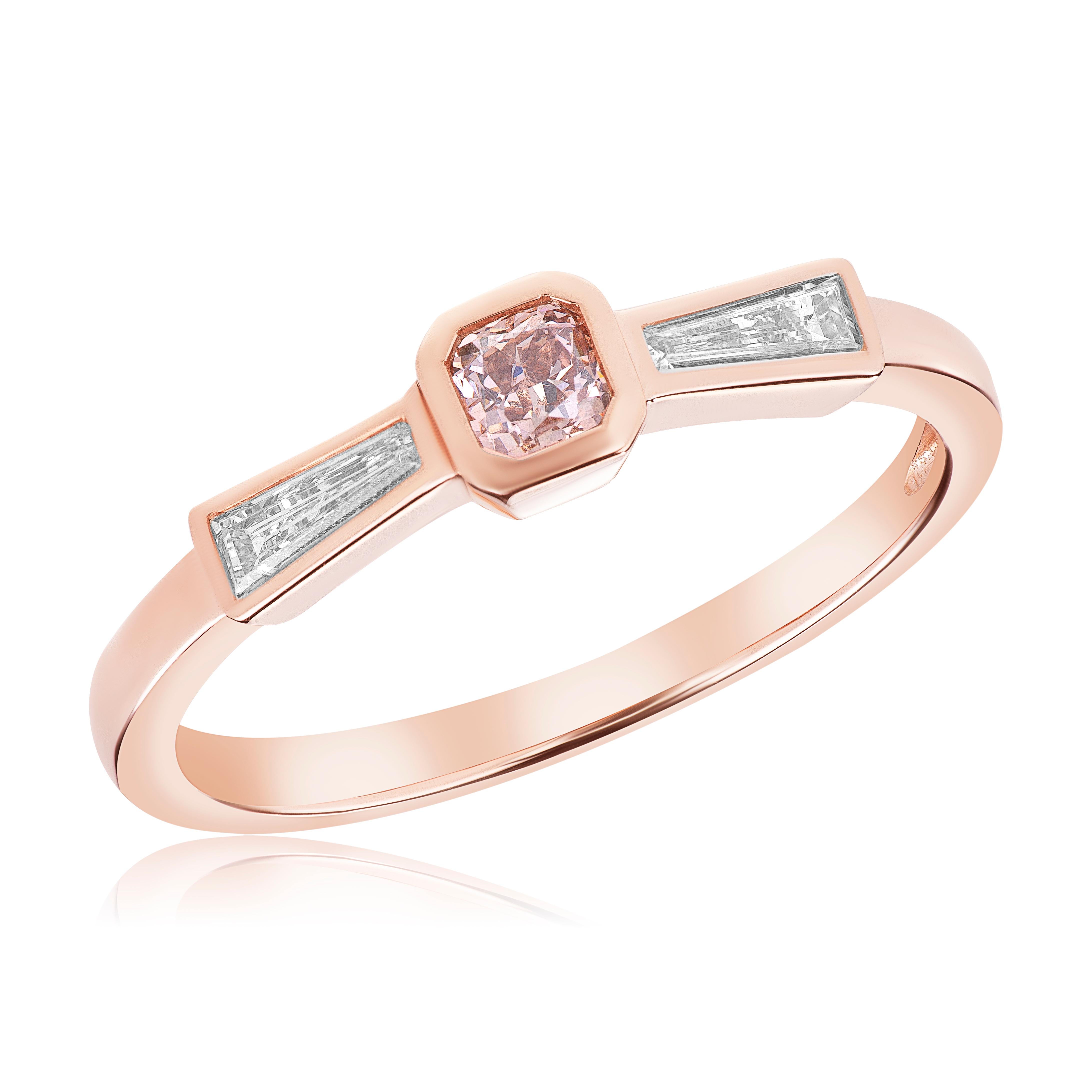 Introducing a captivating rose gold stackable ring that will elevate your style with its exquisite design. This stunning ring features a 0.18-carat fancy pink cushion-cut diamond, radiating with a soft and feminine hue. The diamond is beautifully