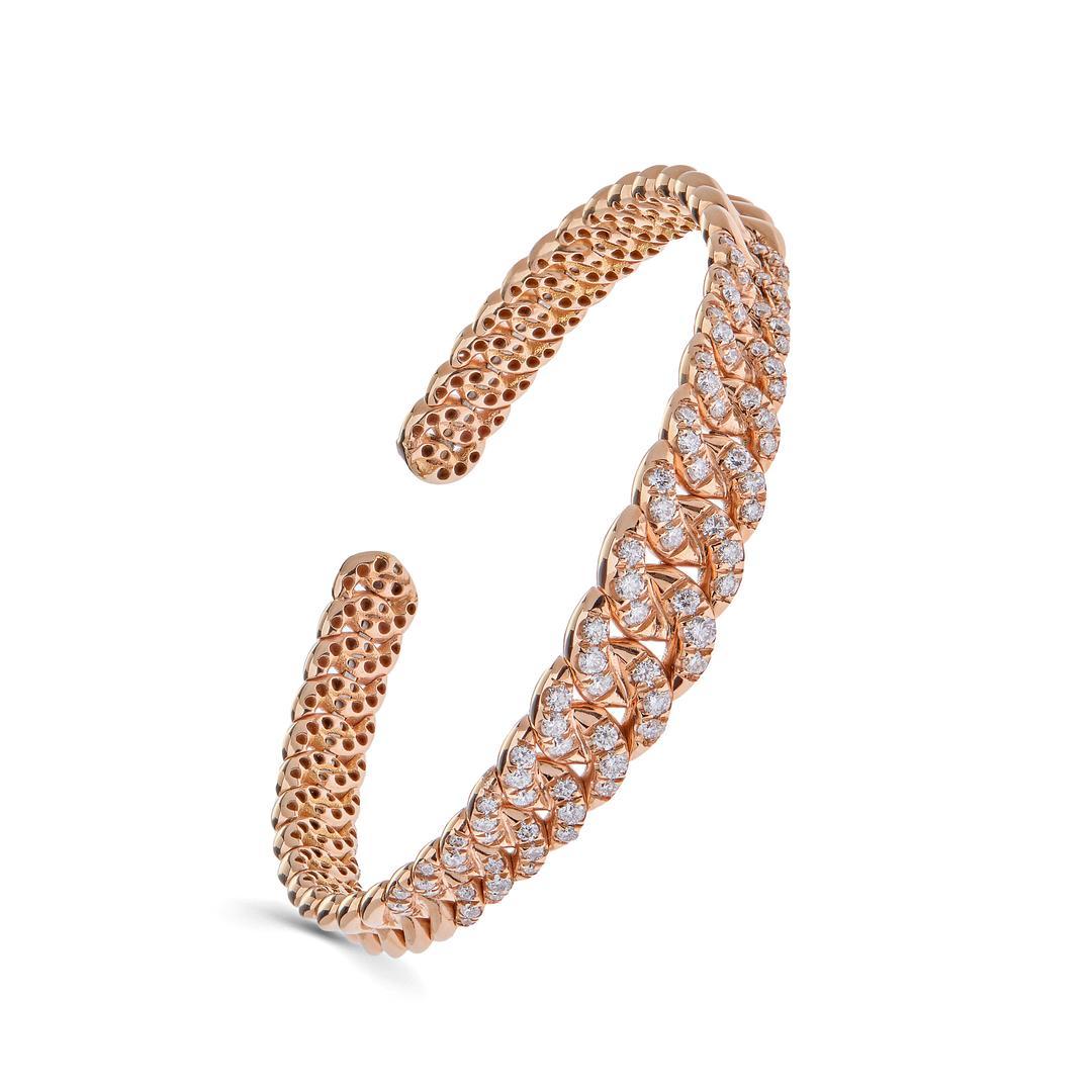 Introducing our exquisite White Gold Graduated Pave Chain Link Cuff Bracelet, a stunning piece that exudes elegance and sophistication. Crafted from luxurious 18-karat rose gold, this cuff bracelet features a unique graduated pave chain link design