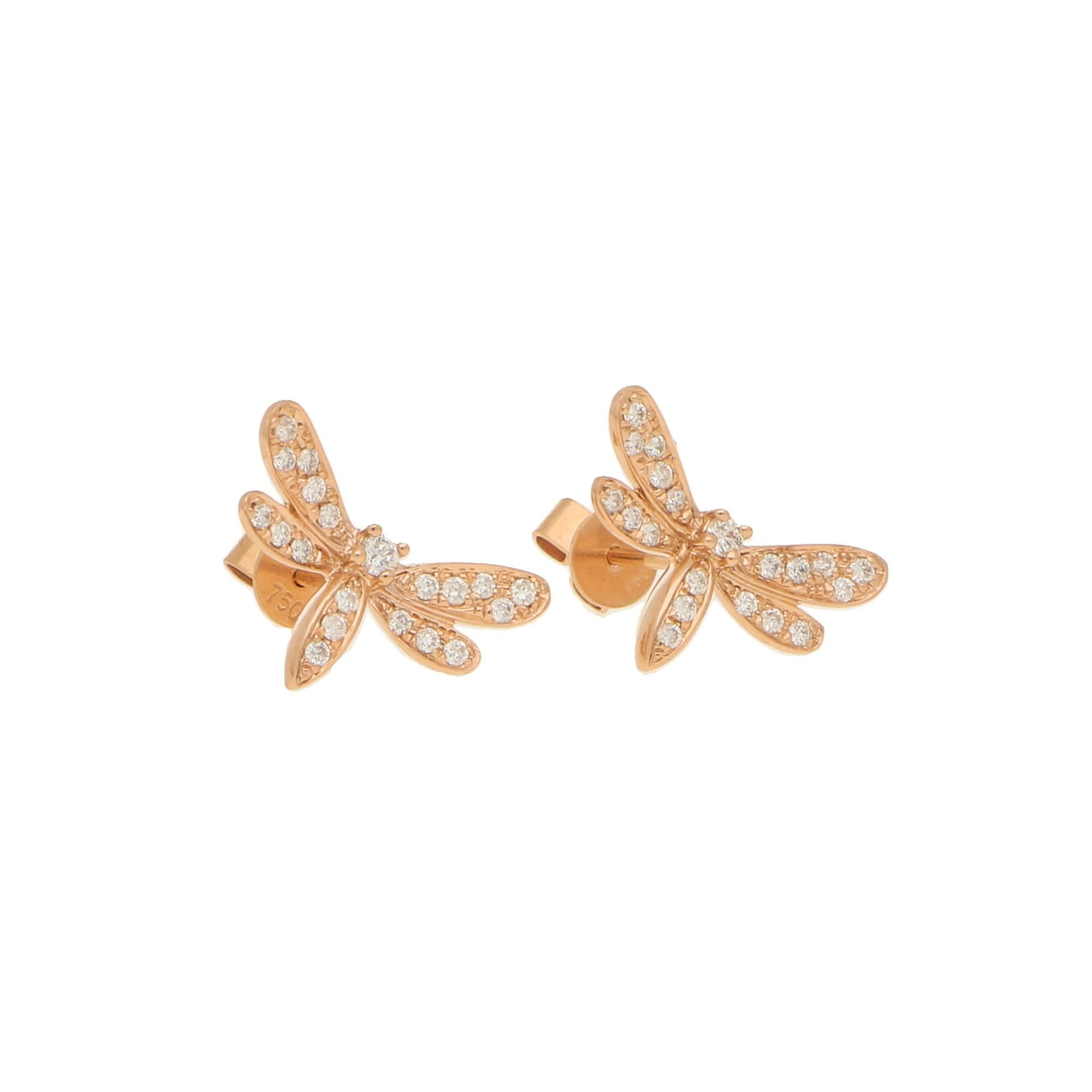 A pretty pair of 18ct rose gold and diamond dragonfly earrings. 
All the diamonds are grain set with 40 round brilliant cut diamonds on the wings, head and body. Secured with a post and scroll fittings. 
Gross weight 2.01 grams. Total diamond weight