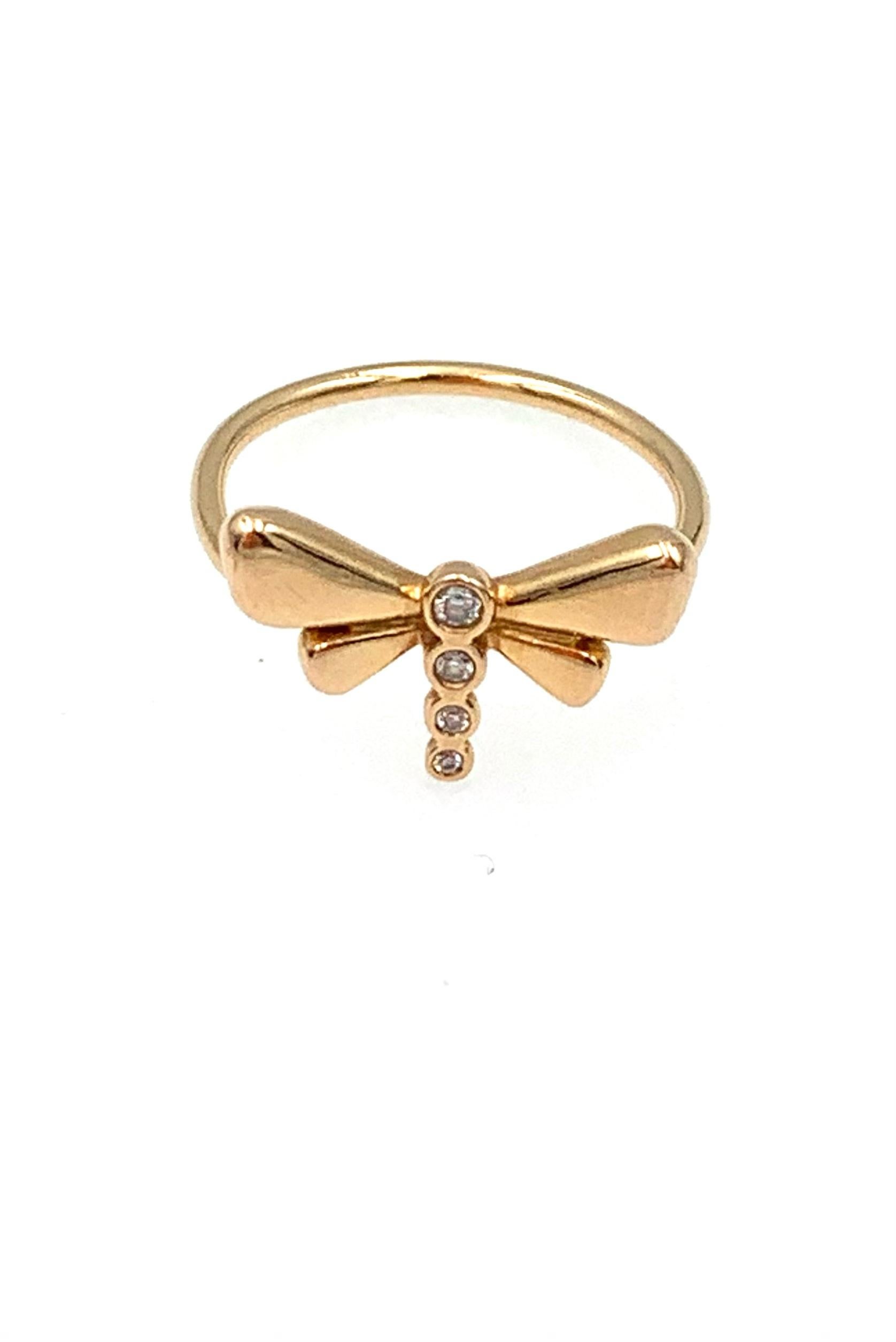 Hand made in 9 karat Rose gold this dainty little ring has 4 Diamonds making up the body of the Dragonfly which weight at approximately .11 carats all together. This is part of our Princess Collection our made to order designs, bespoke to our