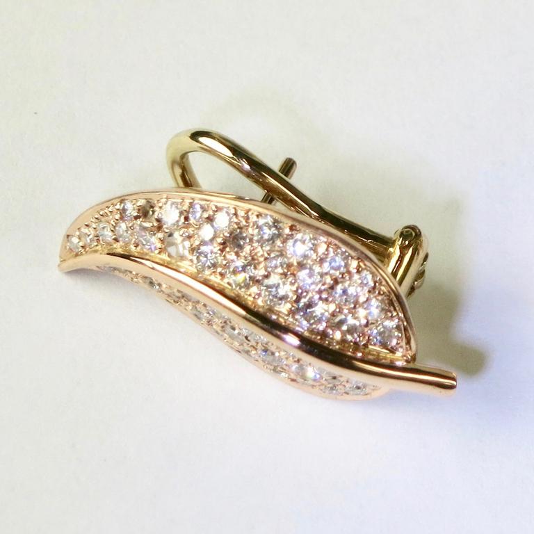 Enchanting 18 carat rose gold diamond set pavé earrings. Please note this item is made to order and a similar but not identical piece can be made. Allow four weeks to delivery. 

Esther Eyre has been designing and making precious jewellery for over
