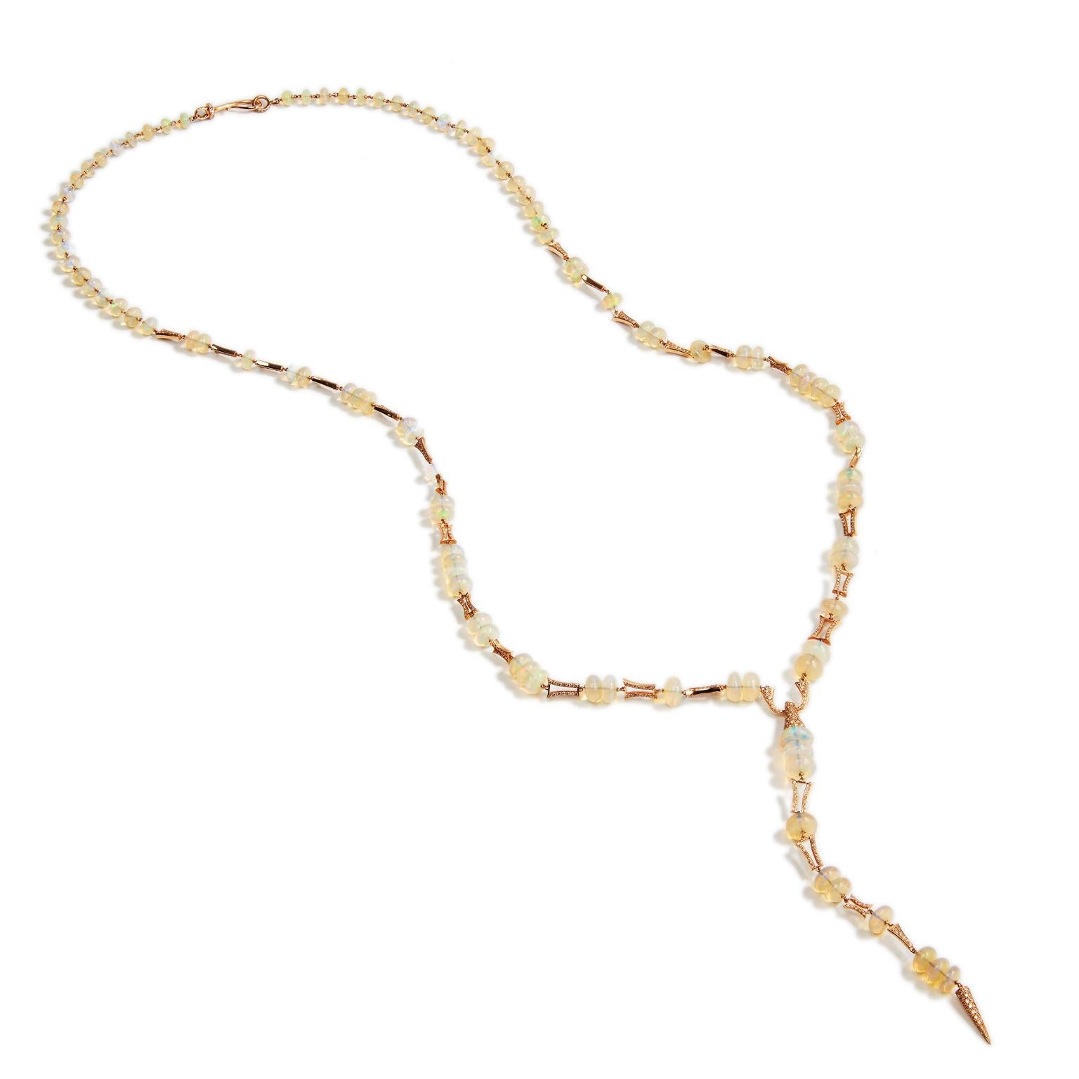 Make a statement to your style with this fashion forward rose gold 34 inch necklace. Highlighted with 1.84 carats of pave-set brown diamonds, and 72.90 carats in total weight of beautifully translucent Opal beads.