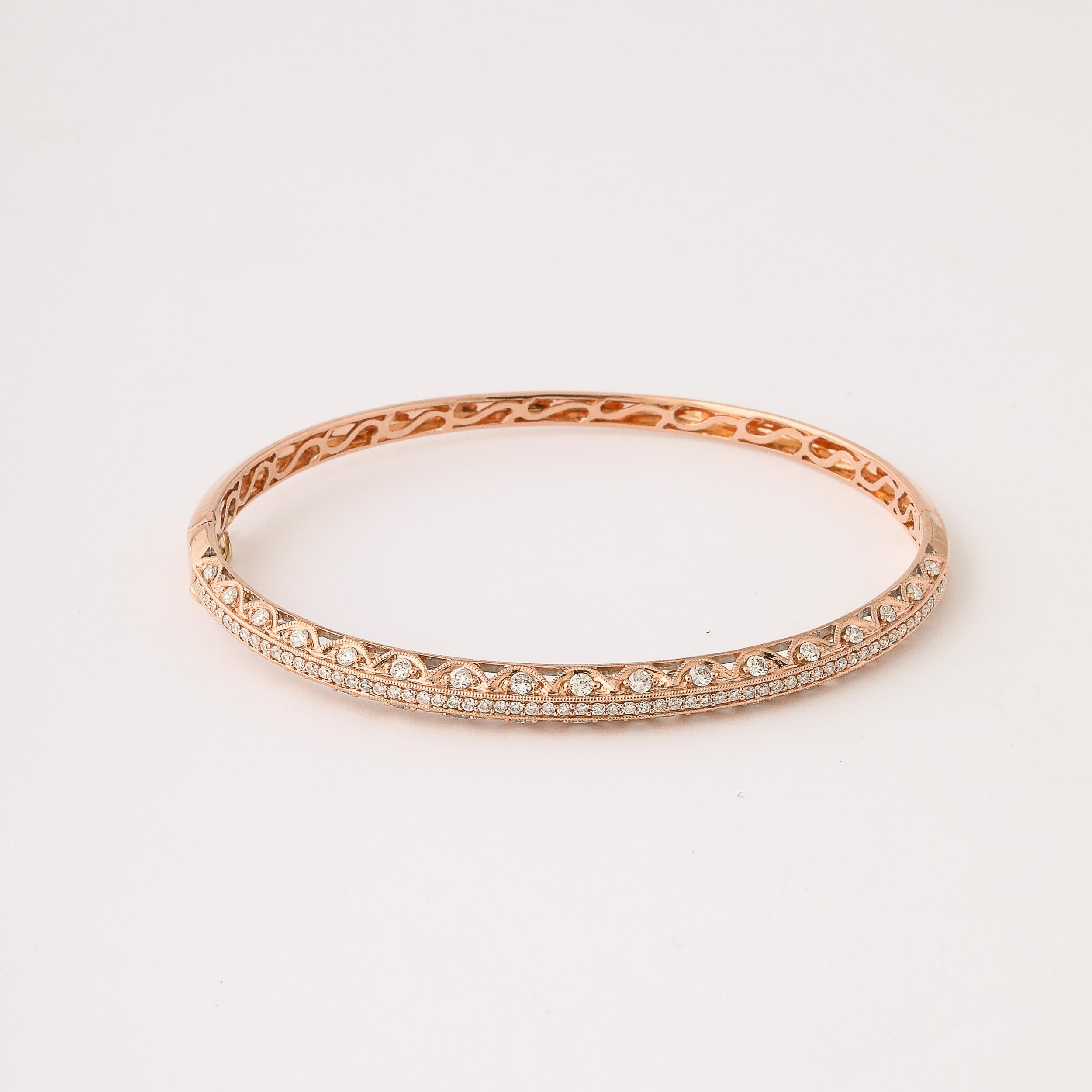 This stunning Rose Gold and Pave Diamond Encrusted  Bracelet originates from Italy, Circa 1950. Featuring a beautifully proportioned graduated form with gently achieved beveled edges achieving a flattened outer surface with gently sloped sides, on