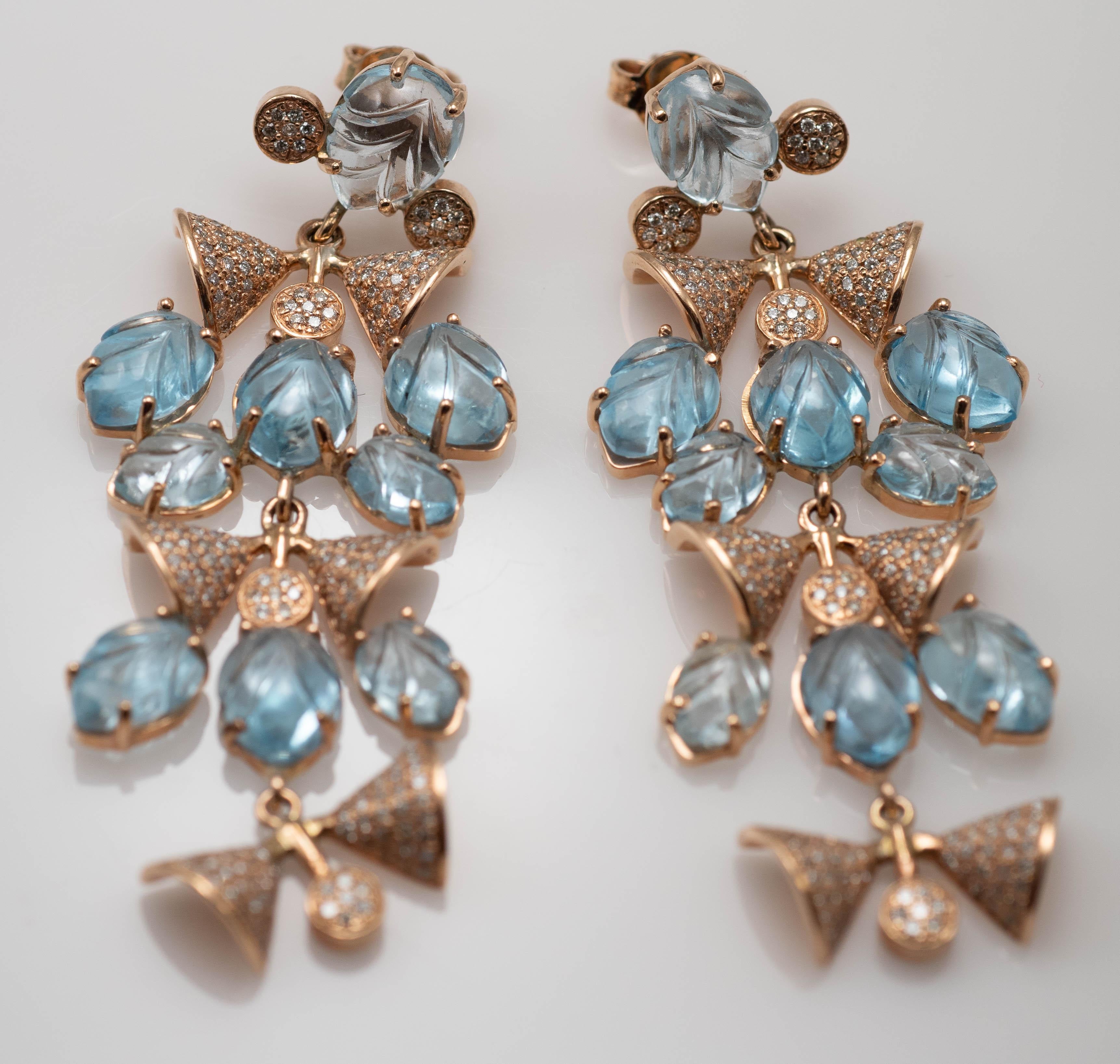 14 Karat Rose Gold Diamond And Aquamarine Post Earrings
Total Weight of 27.50 Grams
Total of 16.50 Carats Round Brilliant Diamonds Mounted In Pave Setting 
Pear Shaped Carved Aquamarine Mounted In Prong Setting
They Measure 2.5 Inches In Length And