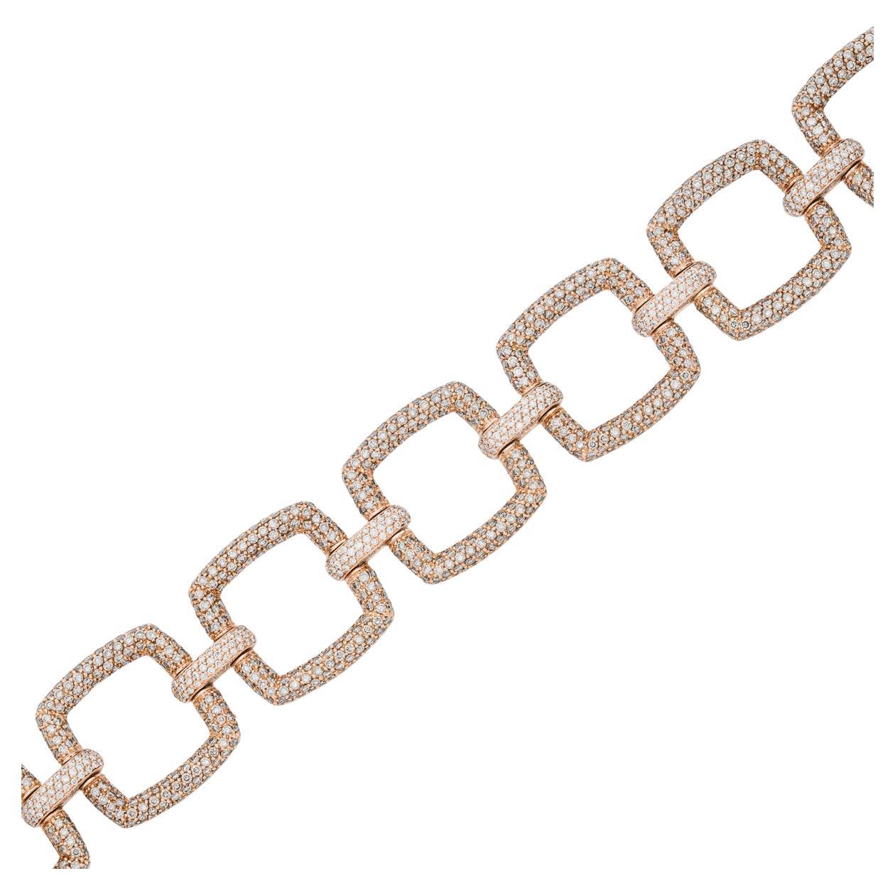 A gorgeous 18k rose gold diamond link bracelet. The bracelet features 7 square links adorned with 1,190 pave set round brilliant cut brown diamonds, with an approximate total weight of 11.90ct. Linking the square motifs together is 7 bar motifs pave