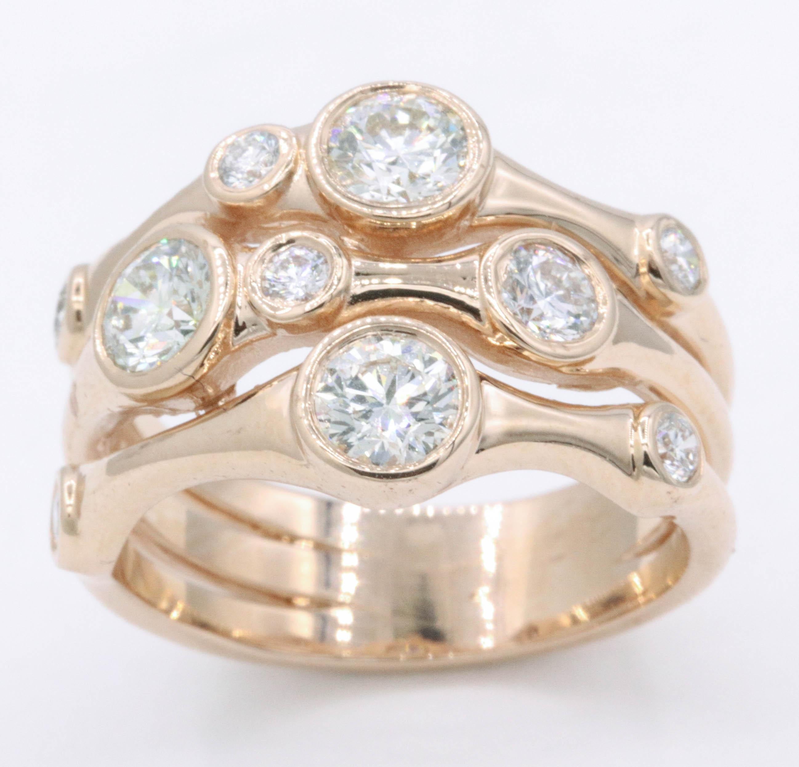 This 14 rose gold bubble ring features 10 round brilliants weighing 1.34 carats. 
Color: G-H
Clarity: SI
Also available in white and yellow gold. 
Size 6.5 