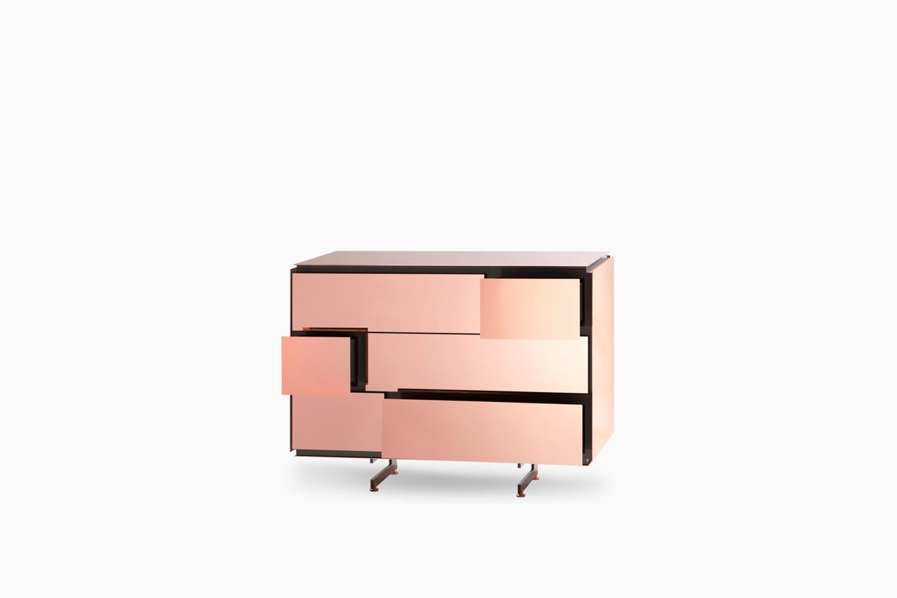 Rose gold chest of drawers by SEM
Dimensions: W 104 x D 50 x H 78 cm
Materials: Polished or fine brushed rose gold plated, Inlays in lacquered wood, Lining of drawers in mohair velvet

SEM is a new brand of home furnishings, designed and