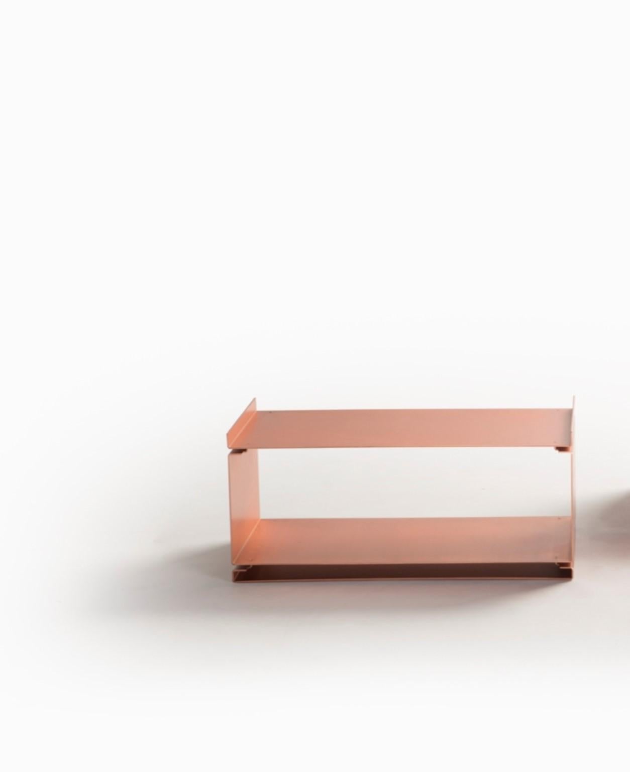 Rose gold coffee table by SEM
Dimensions: W 70 x D 35 x H 30 cm
Material: Polished or fine brushed Rose Gold plated

SEM is a new brand of home furnishings, designed and produced in Italy. The preview show at Milan Design Week 2018 represents an