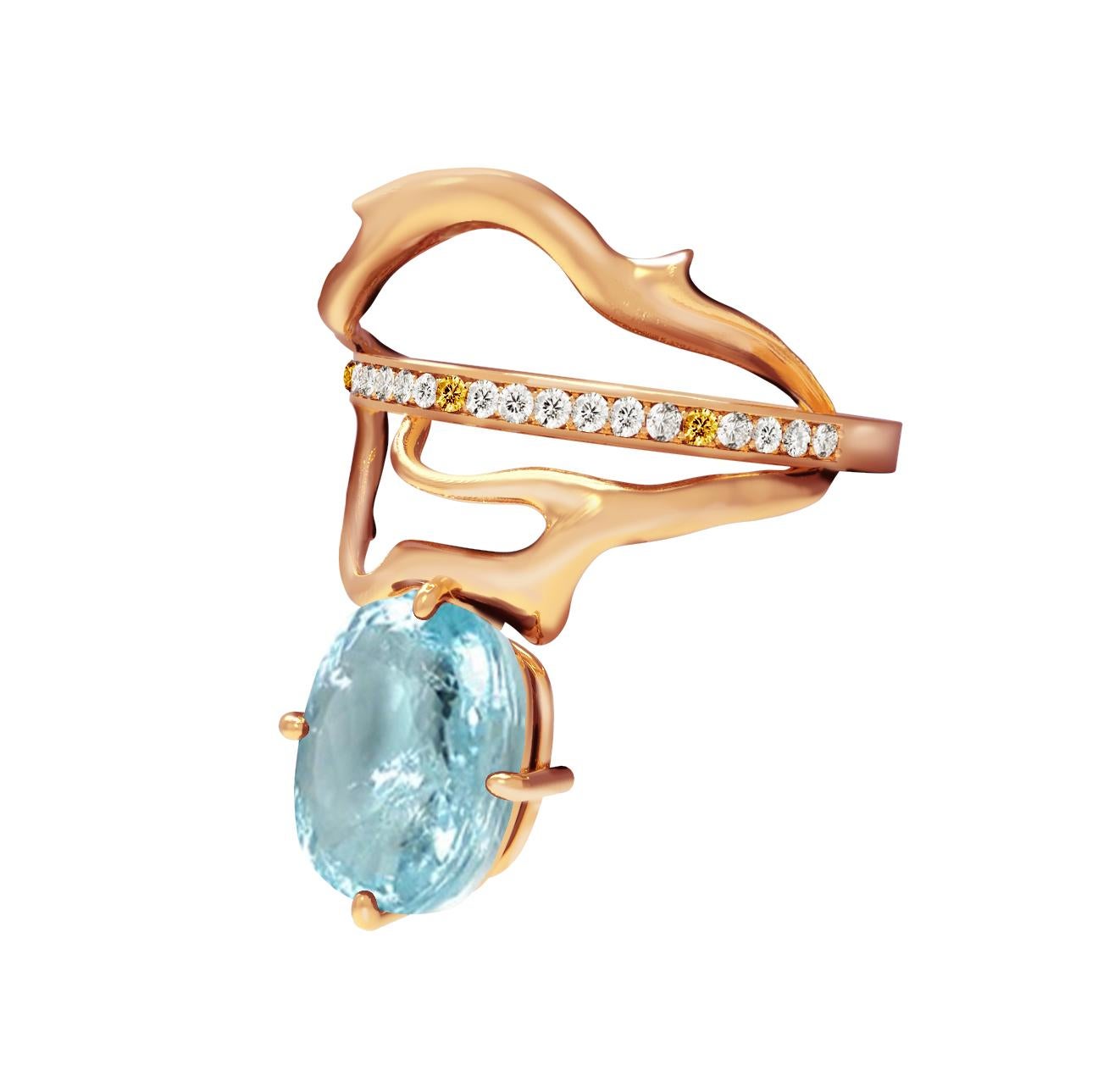 This Tibetan 18 karat rose gold contemporary ring is encrusted with diamonds, yellow sapphires, and oval cut paraiba tourmaline  (neon copper bearing, 2,4 carats, blue with inclusions). Size is custom made. Can be ordered with different gems.
It was