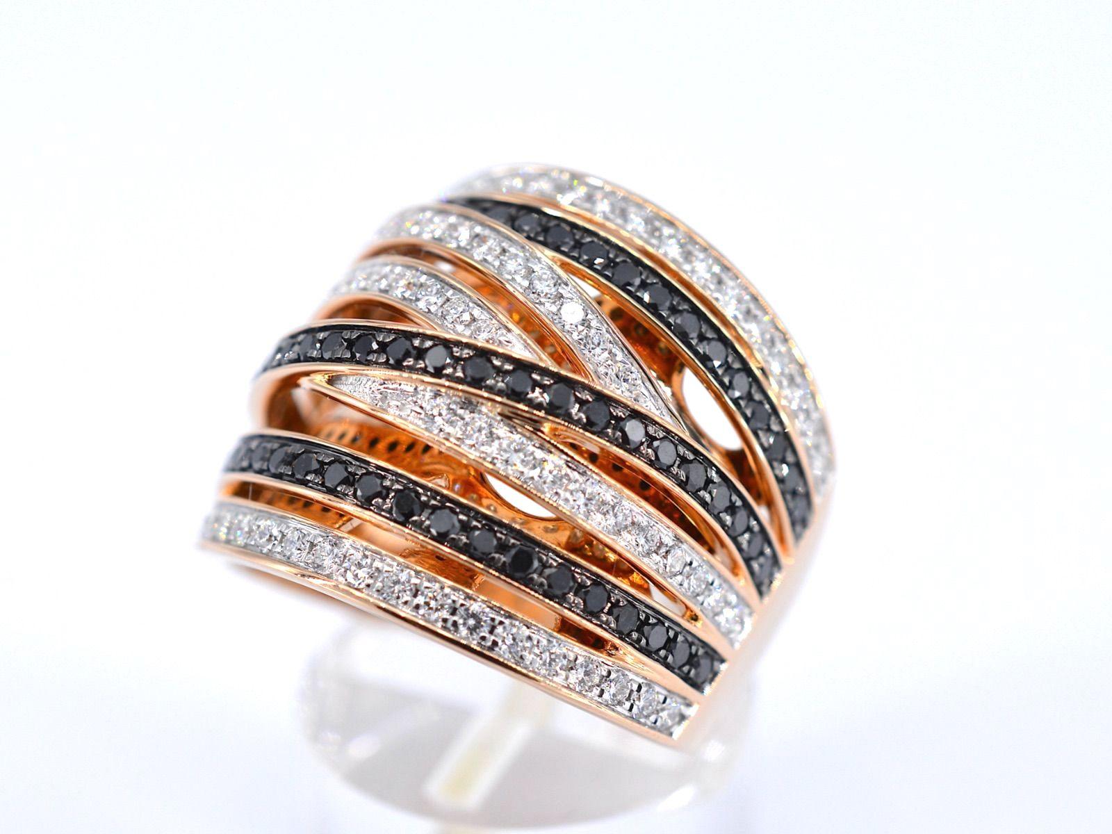 Diamonds: Naturally Shiny
Weight: 1.50 carat
Shape: Brilliant cut
Colour: high white (F-G) and black (enhanced)
Clarity: US
Quality: Very nice

Jewel: Ring
Weight: 11 gram
Hallmark: 18 karat 
Ring size: 54 (17.25 mm)
Condition: New

Retail value: €
