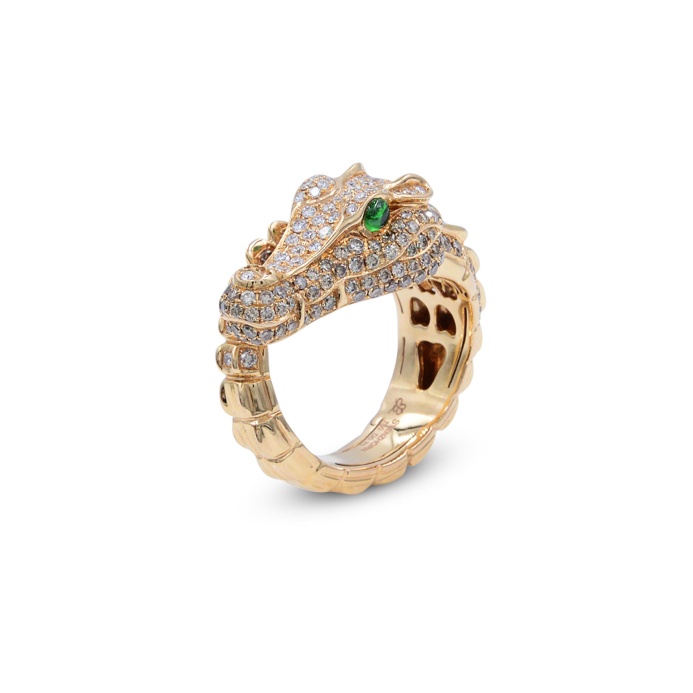 Whimsically fashioned as an Alligator with micro pave-set diamond body and raised bezel emerald eyes, mounted in 18k rose gold, signed Stenzhorn.

A spectacular fun and sexy gator ring featuring 1.00cts round brilliant cut diamonds. 
The eyes of