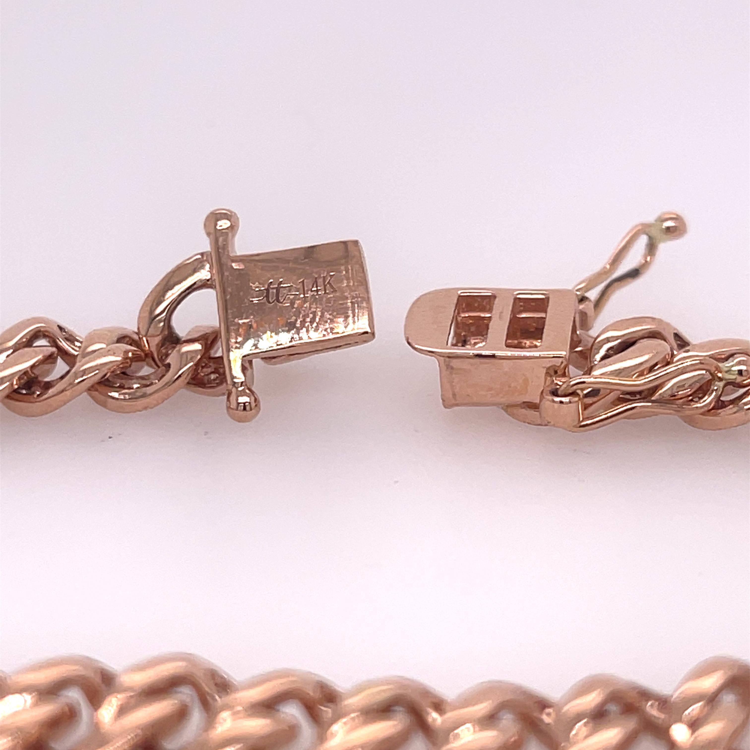 Diamond curb link bracelet set in 14K rose gold. The bracelet has approximately 3ctw of brilliant round cut diamonds.  Stamped TT 14K. 