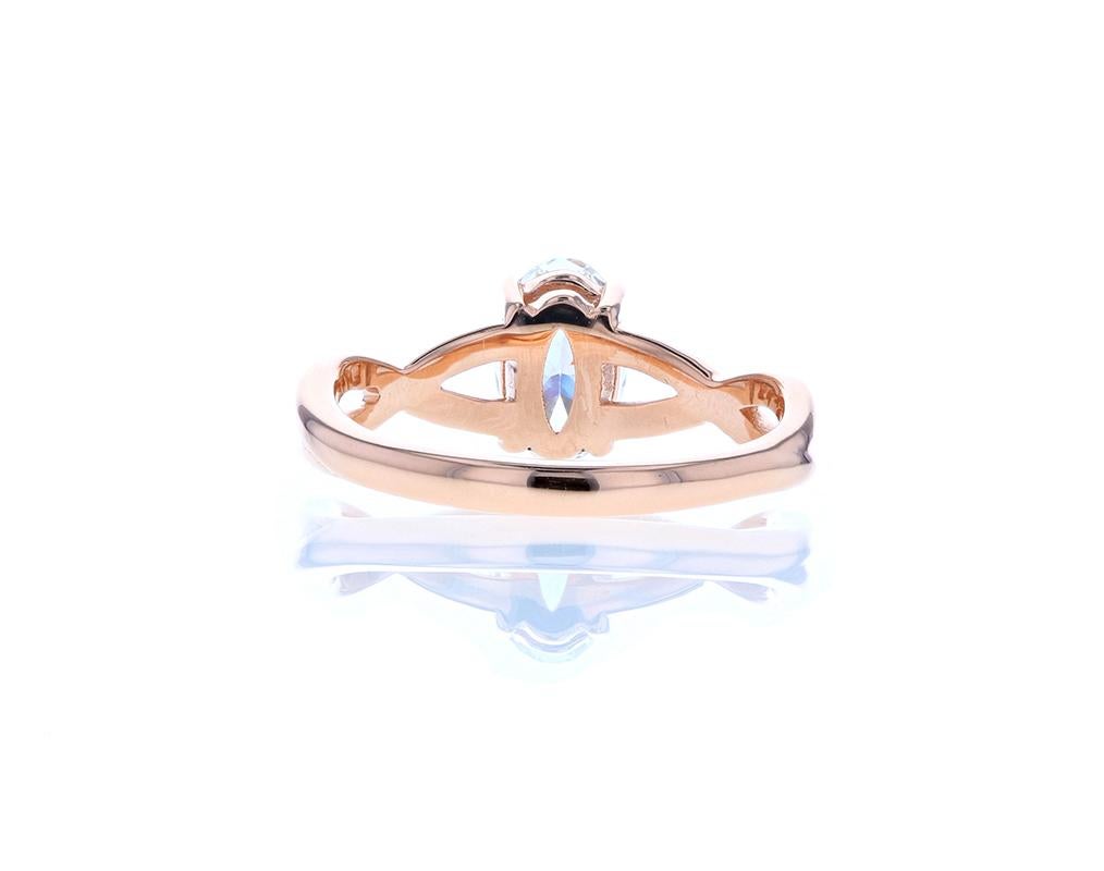 This classy oval diamond engagement is traditional in style but has a unique twisted shank. The ring is crafted in rose gold and is perfect for any kind of center diamond. This ring can be customized for any center stone and in any color