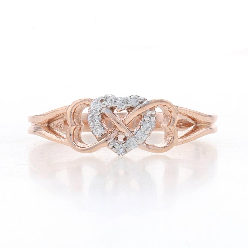 Size: 8 1/2
Sizing Fee: Up 2 sizes for $40 or Down 2 sizes for $35

Metal Content: 10k Rose Gold & 10k White Gold

Stone Information
Natural Diamonds
Carat(s): .08ctw
Cut: Round Brilliant
Color: G - H
Clarity: SI2 - I1

Theme: Infinity Heart Trio,
