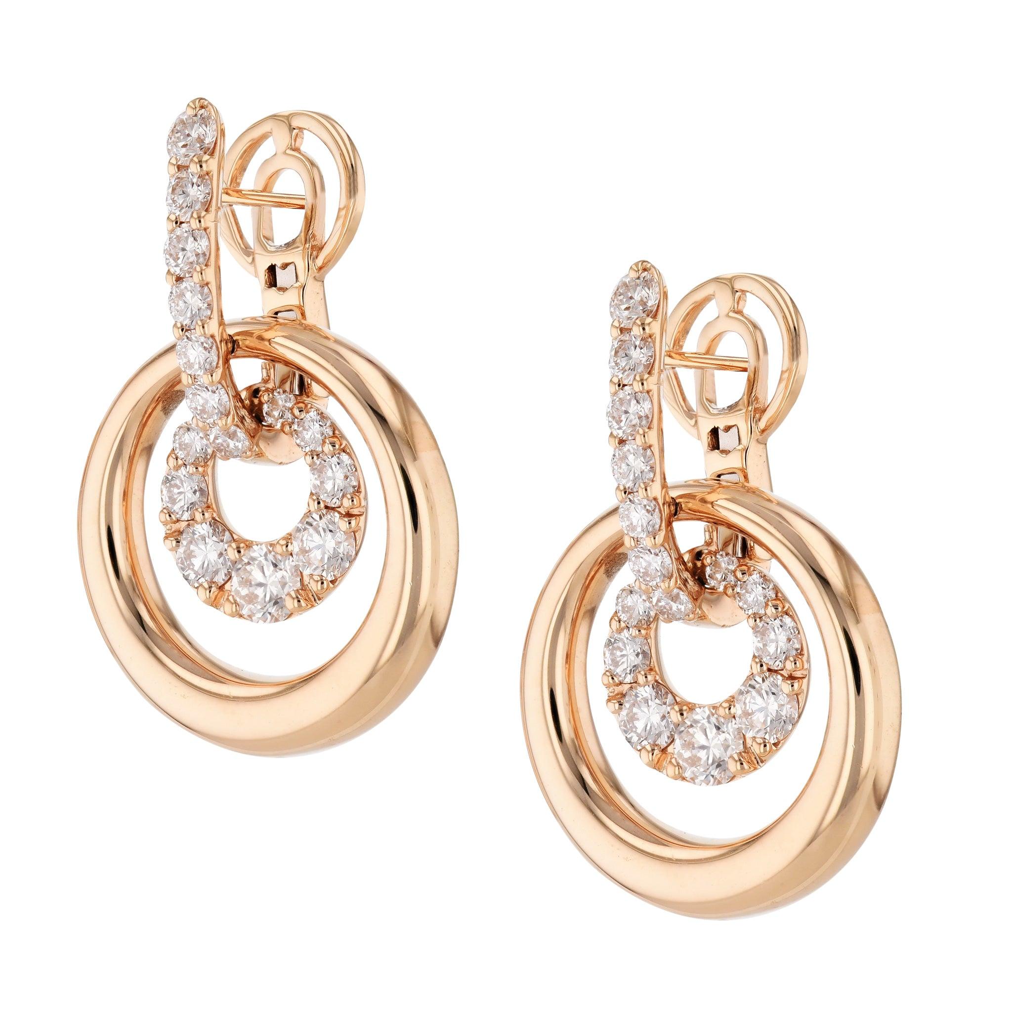 Stunning 18 karat Rose Gold Hoop Drop Earrings, elegantly encrusted with shimmering diamonds! Perfect for dressing up any look, these magnificent inside-out hoops will draw admiration and envy in equal measure! 18 karat . Rose Gold Earrings with