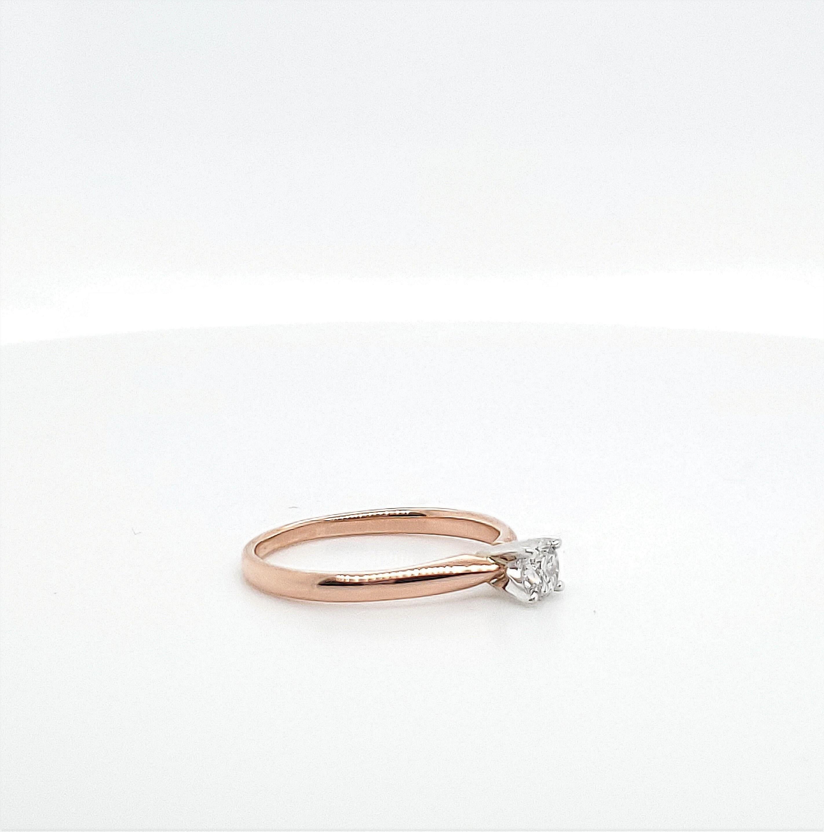 rose gold solitaire diamond ring