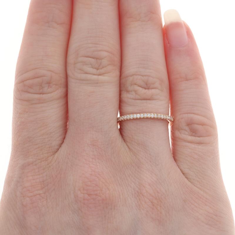Size: 6

Metal Content: 18k Rose Gold

Stone Information

Natural Diamonds
Carat(s): .29ctw
Cut: Round Brilliant
Color: I - J
Clarity: SI1 - SI2

Total Carats: .29ctw

Style: Wedding Band with Stones
Features: Stackable