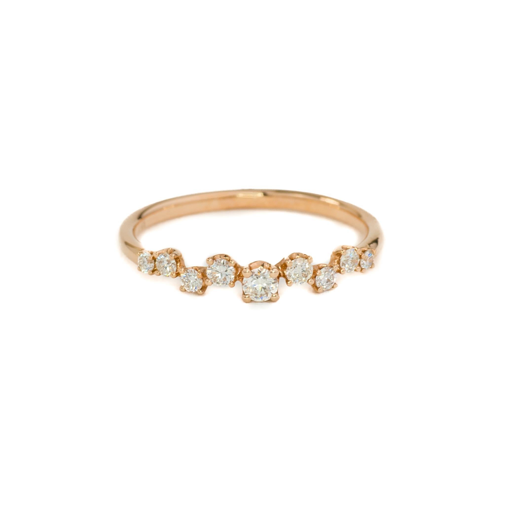 Our diamond cluster ring is made with only the finest ethical diamonds, set to sparkle and shine. The classic design is perfect for adding a touch of glamour to any everyday outfit. Perfect for stacking if desired, this rose gold diamond band is the