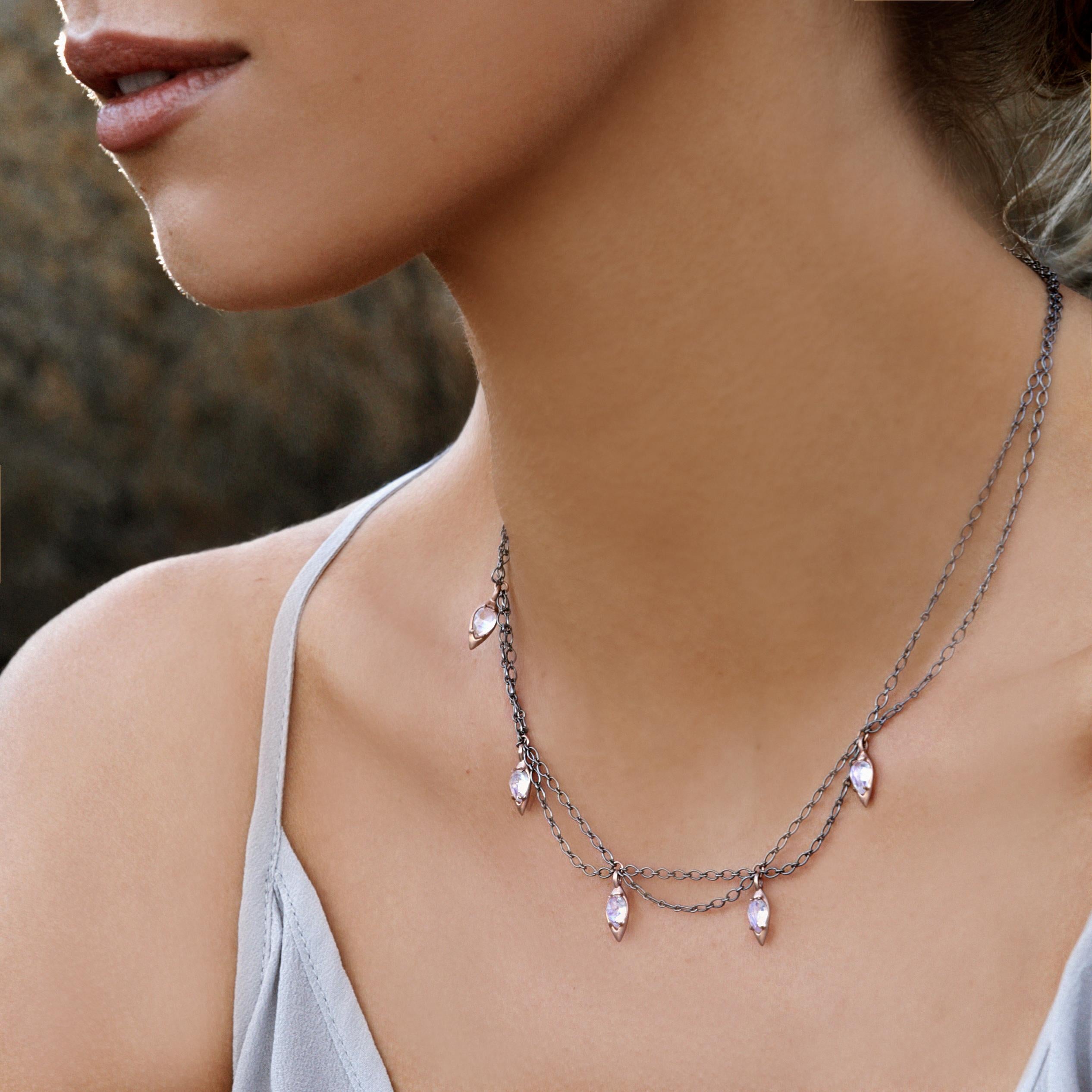 A terrific, free-flowing mix of metals and blue moonstone that attracts the eye and adorns the neck.
The rose gold Scallop necklace with sterling silver chain is a subtle and elegant piece that is classic for your lifestyle.

14kt rose