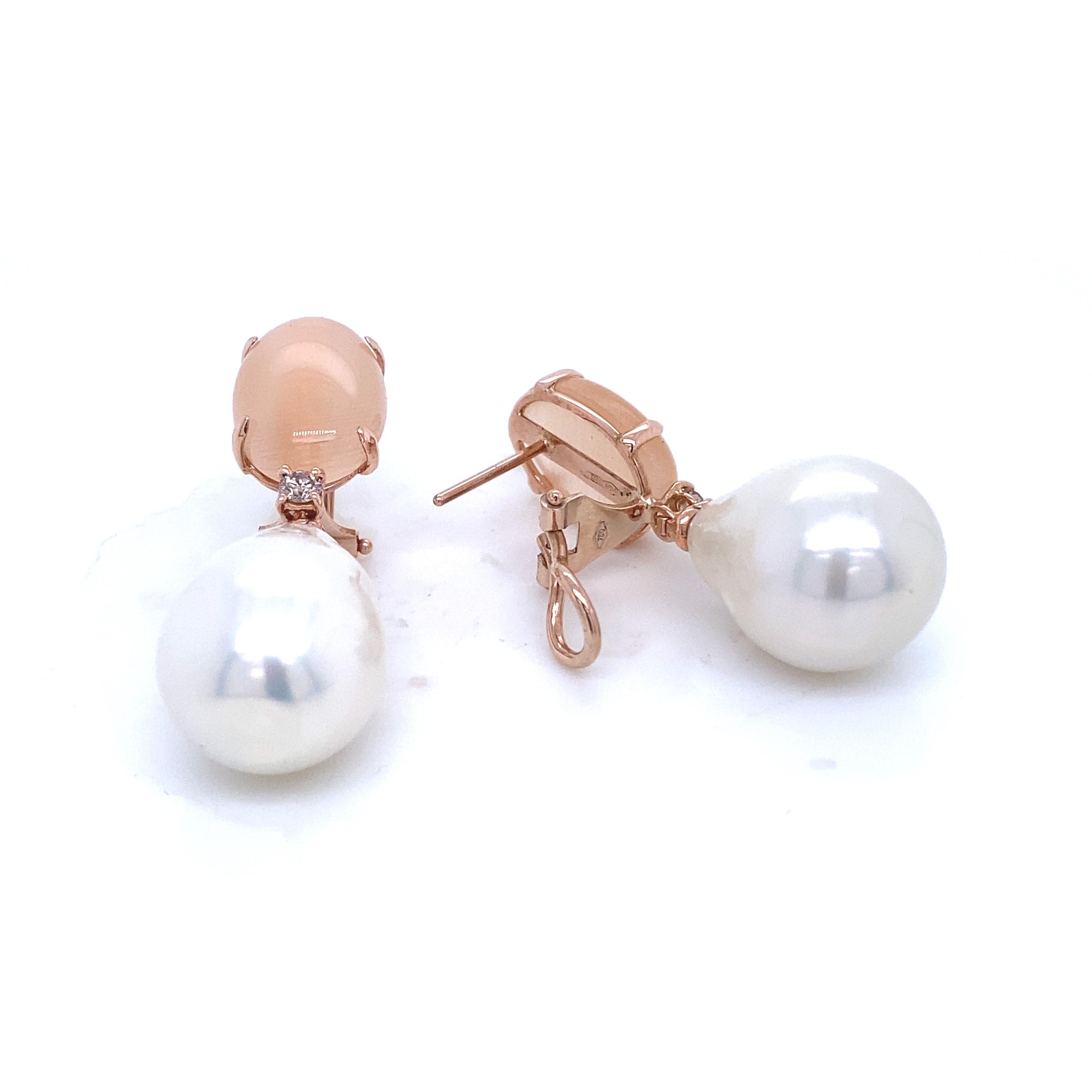 Discover these sumptuous dangling earrings from the Mesure et Art du Temps French collection, in 18-carat pink gold, accompanied by a hydro peach, a freshwater pearl and cognac diamonds. These earrings are a truly exceptional piece of jewelry,