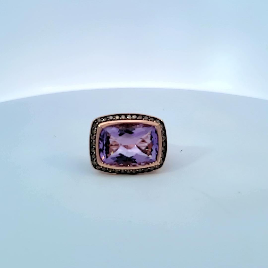 From jewelry designer Effy, this lovely ring in 14 karat rose gold features a beautiful light amethyst and brown diamonds.