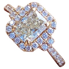 Verlobungsring aus Roségold mit 1 Karat Diamant im Strahlenschliff