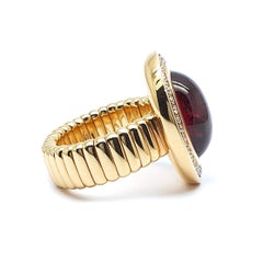 Rose Gold Flex Ring with a 10 Carat Bordeaux Red Tourmaline and 36 Diamonds