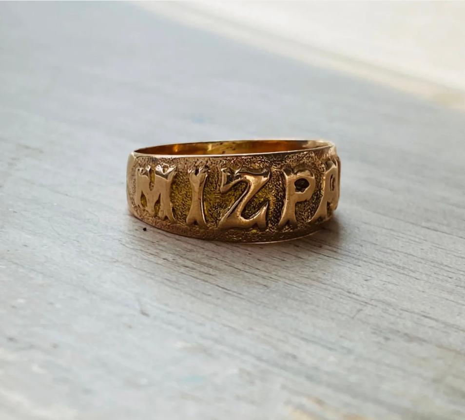 Edwardian 9 Carat Rose Gold Mizpah Ring
Mizpah, a Hebrew word that symbolises a divine watchfulness over two individuals separated from each other. 
This concept flourished in the Victorian and Edwardian eras as a treasured symbol of love,