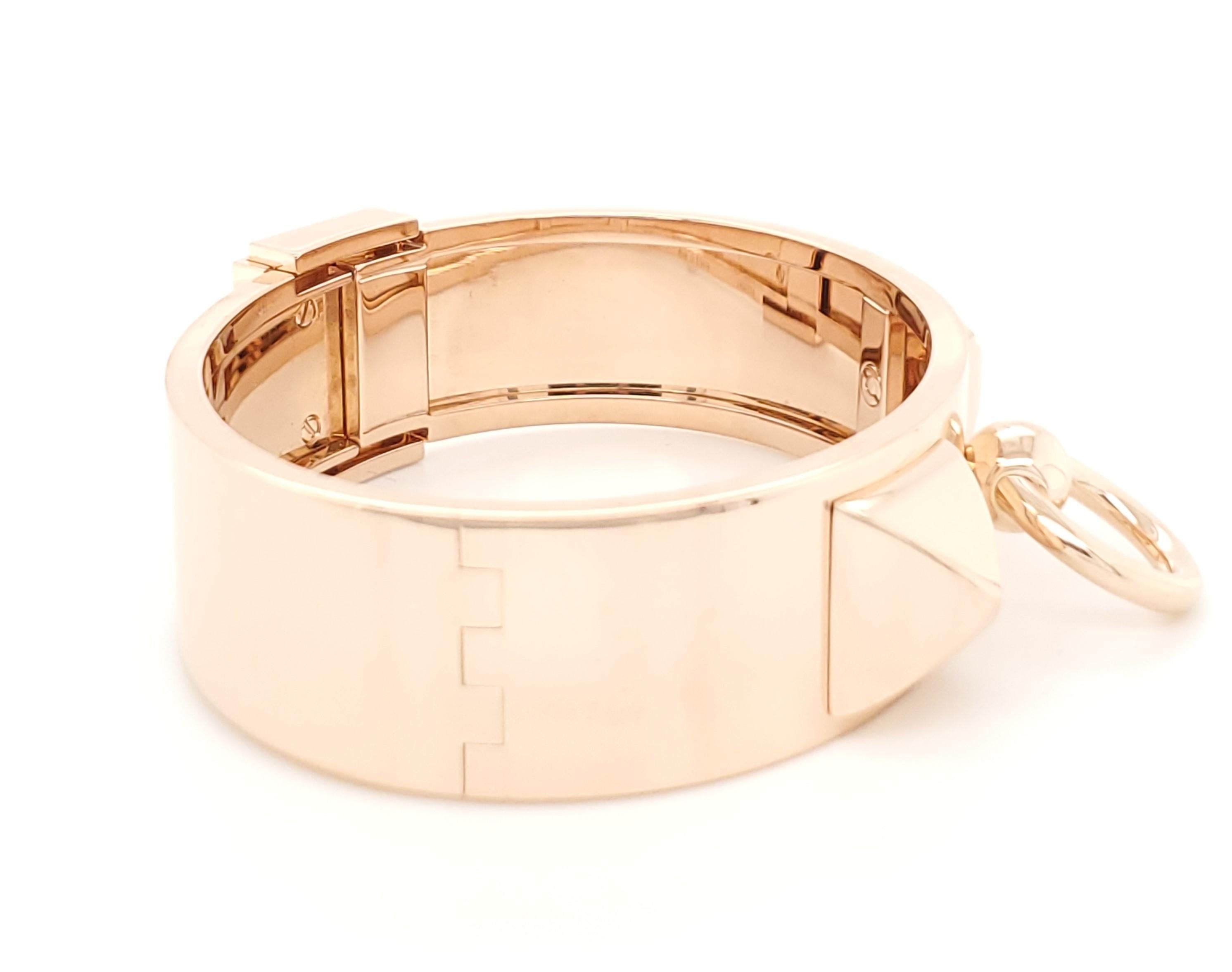 Authentic Hermes Collier de Chien bangle bracelet in 18 karat rose gold. Signed Hermes, Made in France, AU 750.  There are some minor scratches on the inside of the bracelet.  The exterior of the bracelet is in pristine condion.  This bracelet does