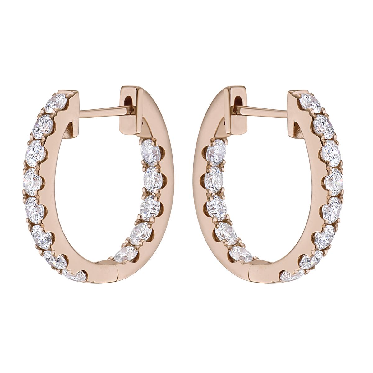 With these exquisite rose gold huggies hoop diamond earrings, style and glamour are in the spotlight. These rose gold hoop earrings are set in 14-karat gold and made from 3.8 grams of gold. The color of the diamonds is GH. The clarity is SI1. These