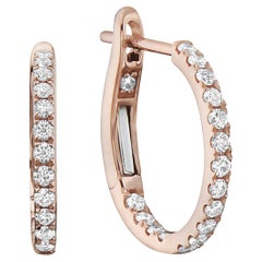 Boucles d'oreilles Huggies en or rose avec diamants