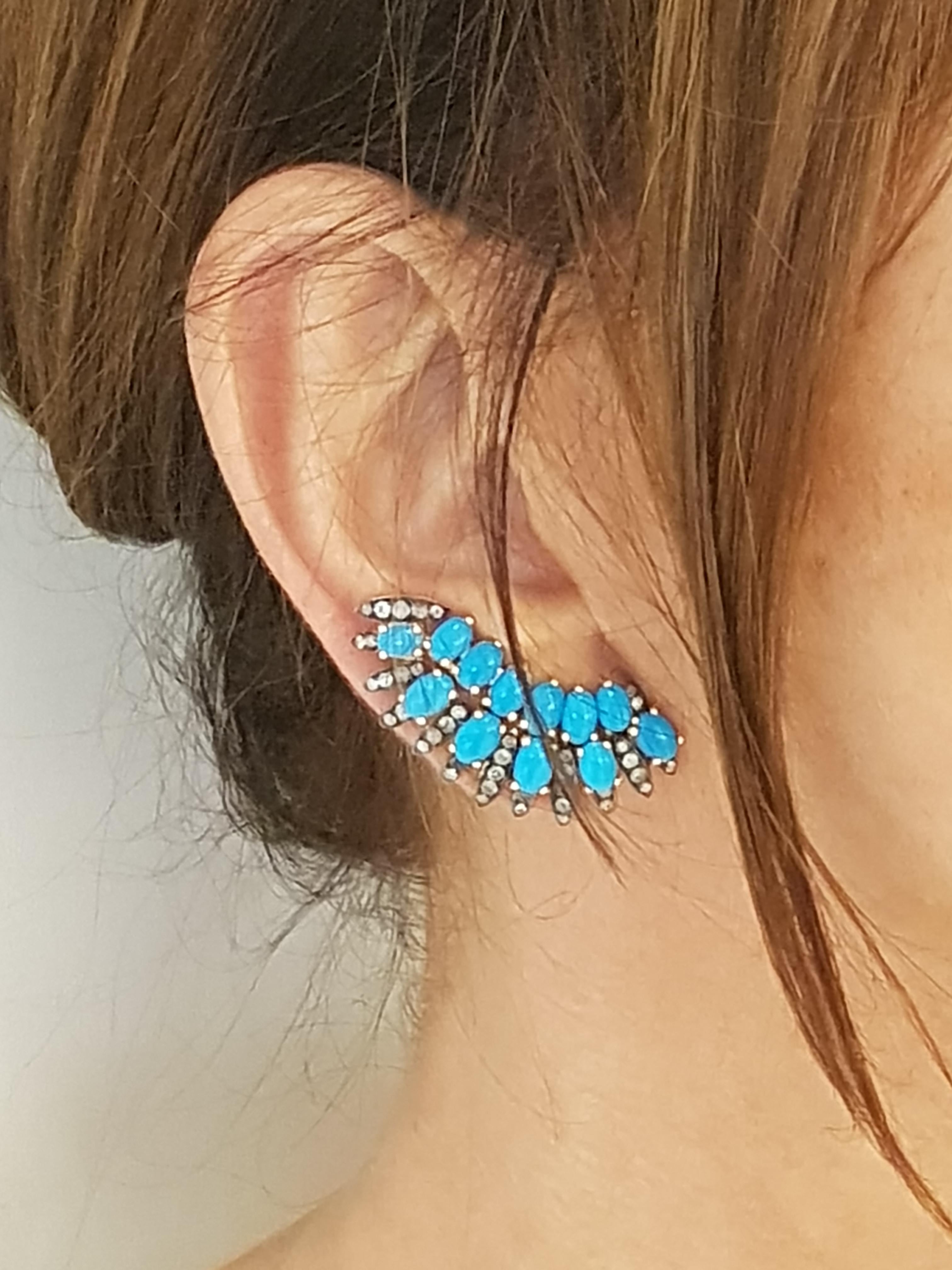 18 Karat Rose Gold Icy Diamonds Turquoise Angel's Wing  Earrings
1,39 Carat Icy Diamond
1,99 Gram Turquoise

Rhodium plated