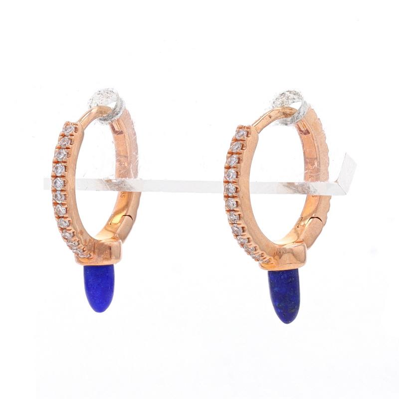 Metal Content: 14k Rose Gold

Stone Information
Natural Lapis Lazuli
Cut: Bullet Cabochon
Color: Blue

Natural Diamonds
Carat(s): .12ctw
Cut: Single
Color: G - H
Clarity: SI1

Total Carats: .12ctw

Style: Huggie Hoop
Fastening Type: Snap
