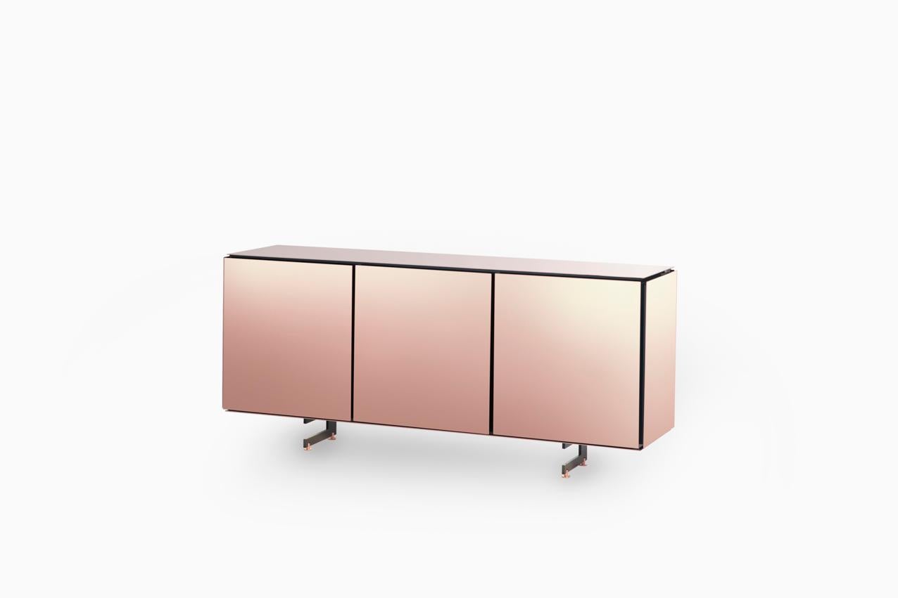 Rose gold large sideboard by SEM
Dimensions: W 160 x D 42 x H 70 cm
Materials: polished or fine brushed rose gold plated, inlays in lacquered wood

SEM is a new brand of home furnishings, designed and produced in Italy. The preview show at Milan