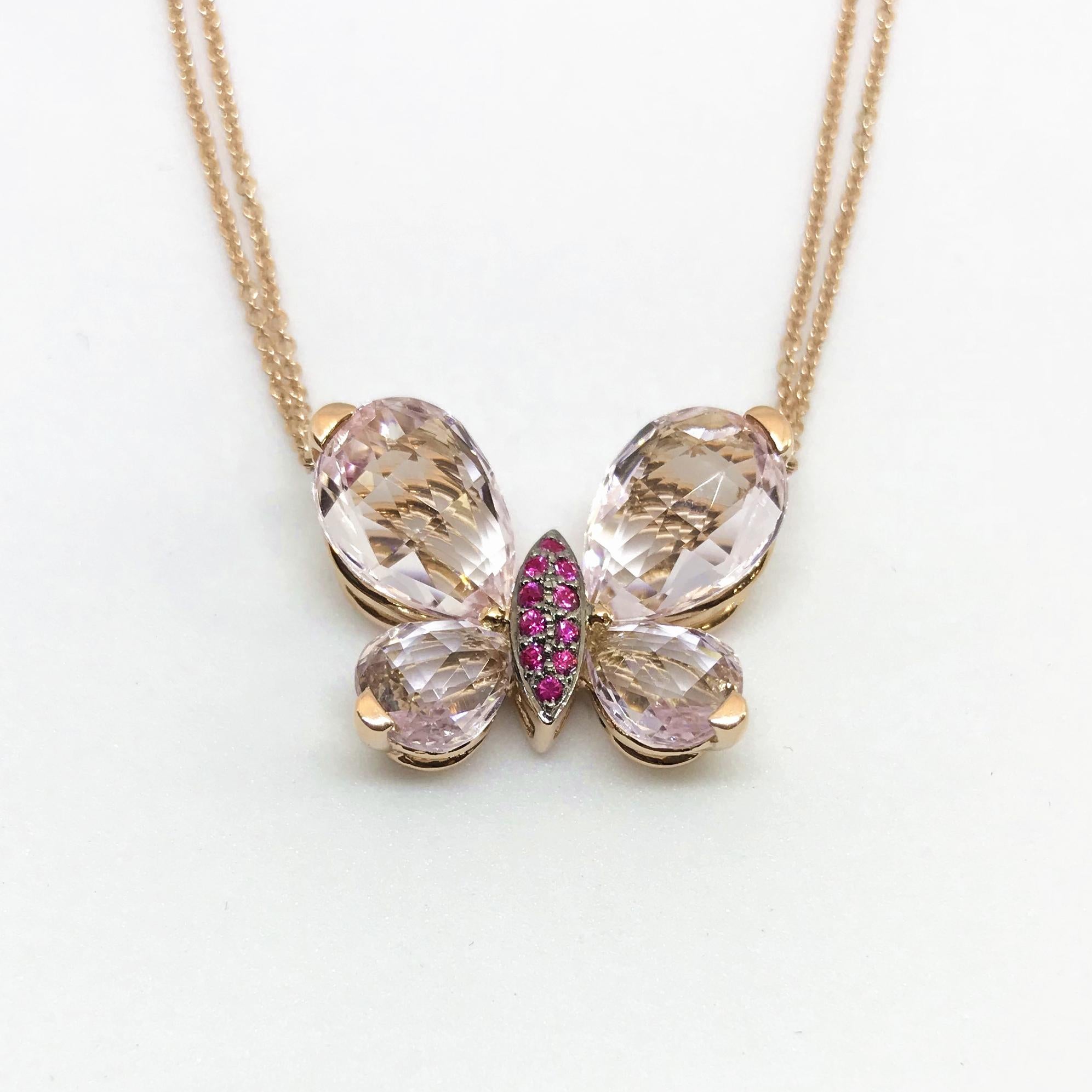 18K Rose Gold Butterfly Pendant with one pair of pear-shaped morganites (5.05 cts), one pair of pear-shaped amethysts (2.48 cts) making up its wings, and 10 small round pink sapphires set on its center body. It is stamped 750 on its back. It is