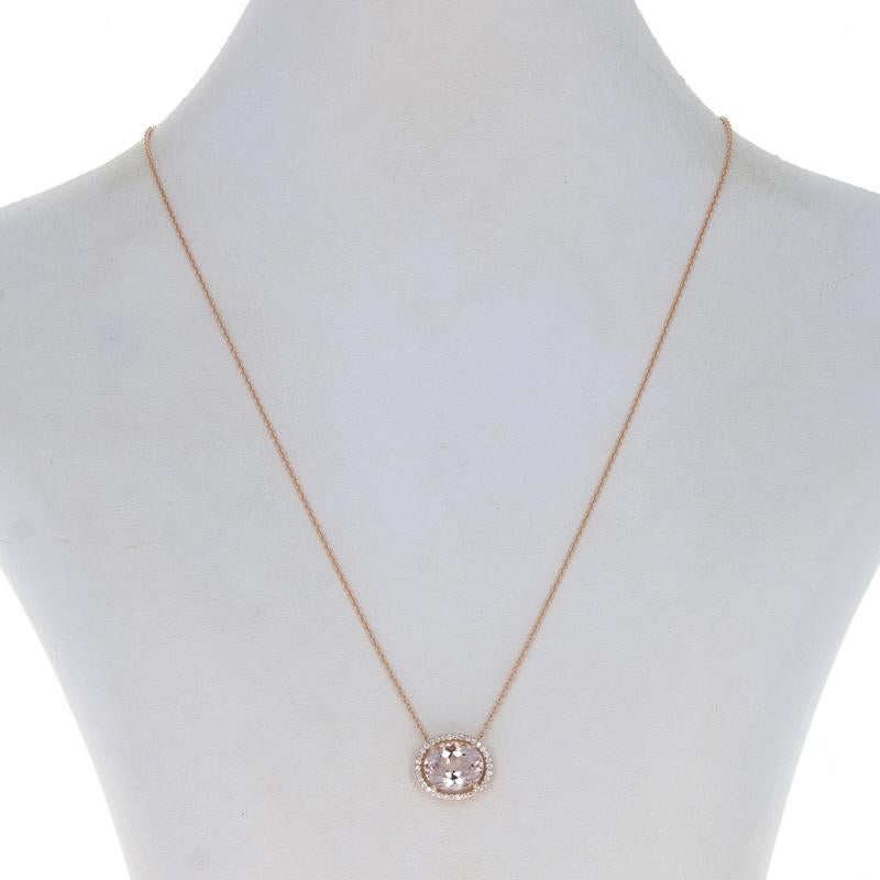 Metal Content: 14k Rose Gold

Stone Information

Natural Morganite
Carat(s): 3.27ct
Cut: Oval
Color: Pink

Natural Diamonds
Carat(s): .27ctw
Cut: Round Brilliant
Color: G
Clarity: SI1

Total Carats: 3.54ctw

Pendant Style: East-West Halo
Necklace