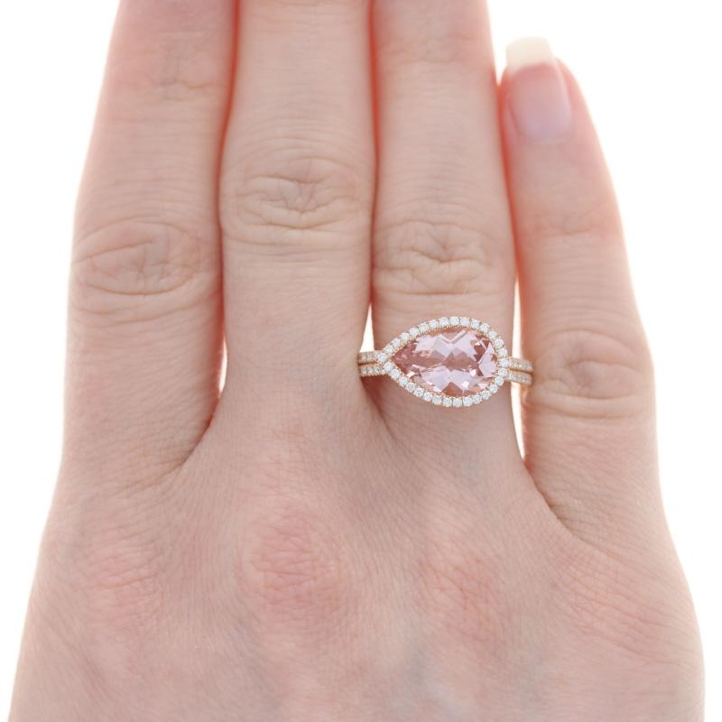 Size: 7

Metal Content: 14k Rose Gold

Stone Information: 
Natural Morganite
Carat: 2.42ct
Cut: Checkerboard Pear Shape
Color: Pink

Natural Diamonds
Carats: .33ctw 
Cut: Round Brilliant 
Color: G 
Clarity: VS2 - SI1

Total Carats: 2.75ctw 

Style:
