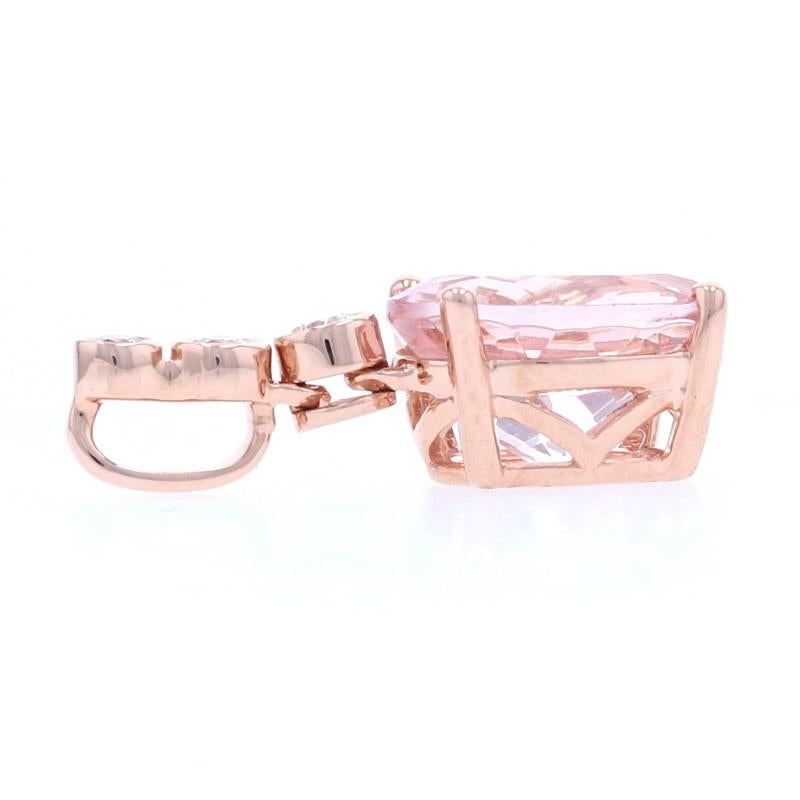 Metal Content: 14k Rose Gold 

Stone Information: 
Genuine Morganite
Carat: 1.86ct
Cut: Oval
Color: Pink
Size: 9mm x 7mm

Natural Diamonds
Carats: .07ctw
Cut: Round Brilliant 
Color: G   
Clarity: SI1 

Total Carats: 1.93ctw

Measurements:
Tall: