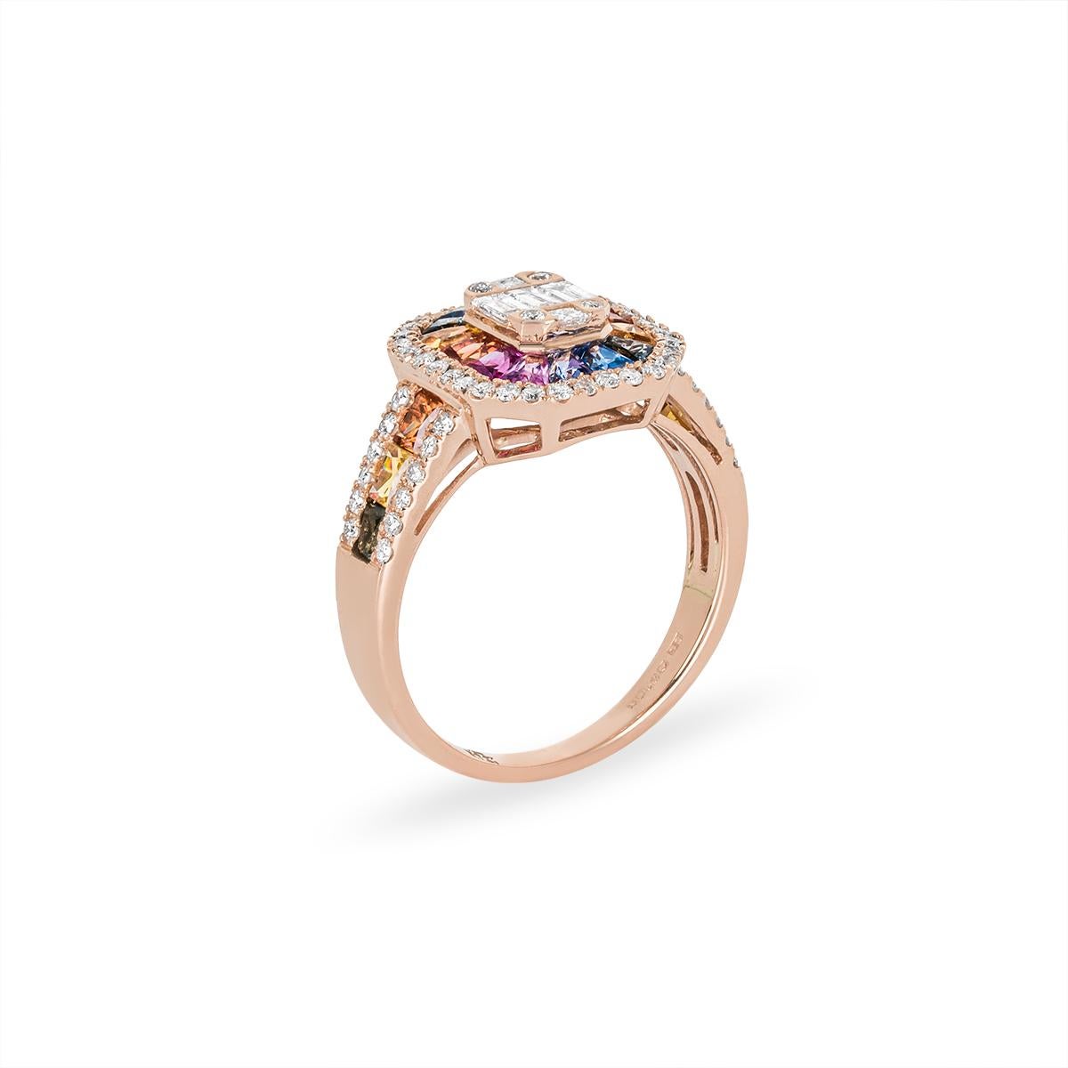 An exuberant 18k rose gold multi-coloured sapphire and diamond dress ring. The centre of the ring comprises of 4 round brilliant cut diamonds, 3 baguette cut diamonds and 2 princess cut diamonds to form an emerald cut illusion. Surrounding the