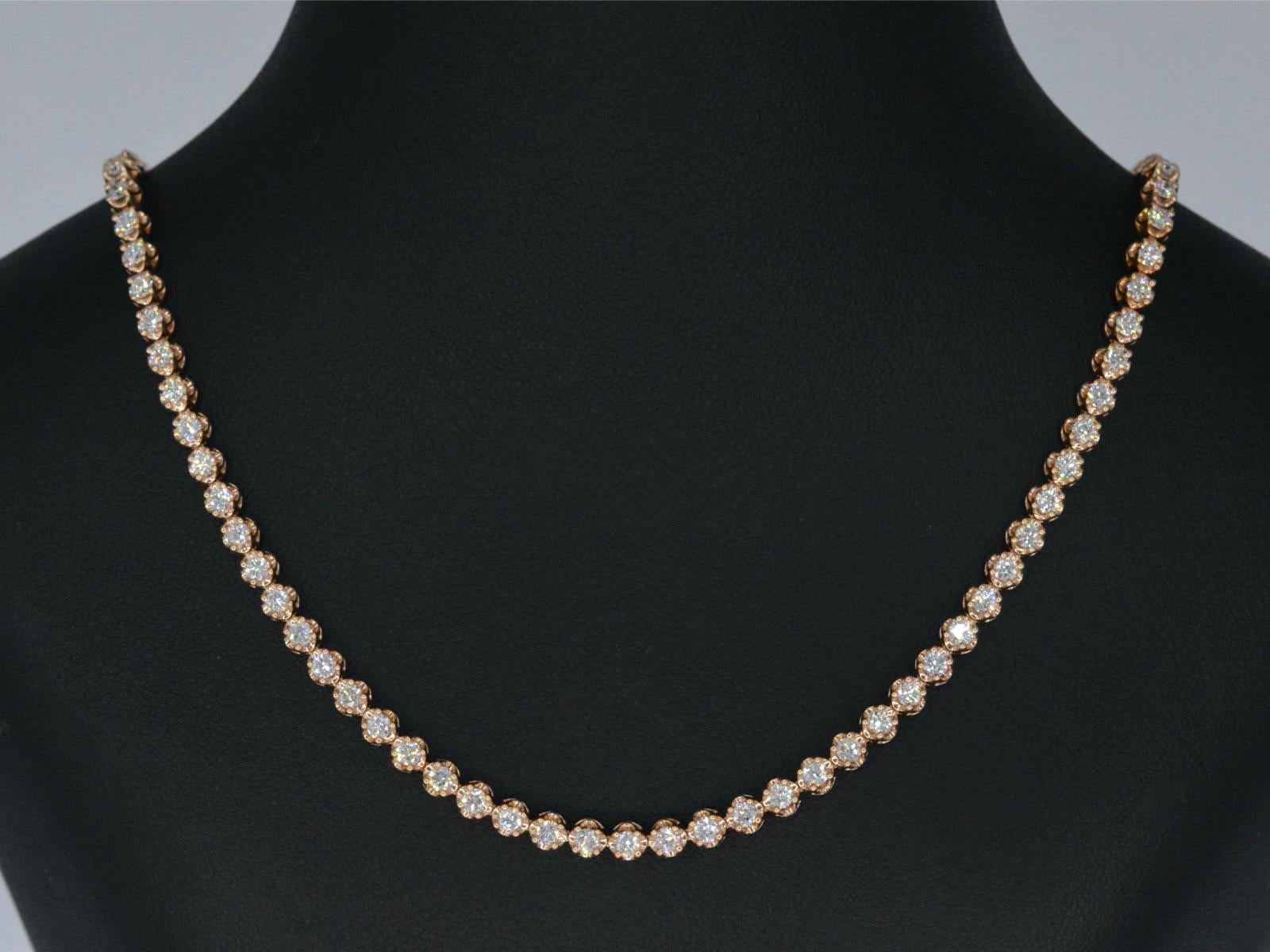 This stunning rose gold necklace boasts 107 brilliant cut diamonds, weighing in at an impressive 6.00 carats. The diamonds are of exceptional quality, with a colour grade of F-G and clarity grade of VS. The necklace itself is crafted from 18K gold