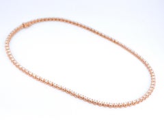 Collar de oro rosa con 107 diamantes talla brillante