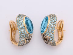 Rose Gold, Oval Blue Topaz and Diamond Earrings