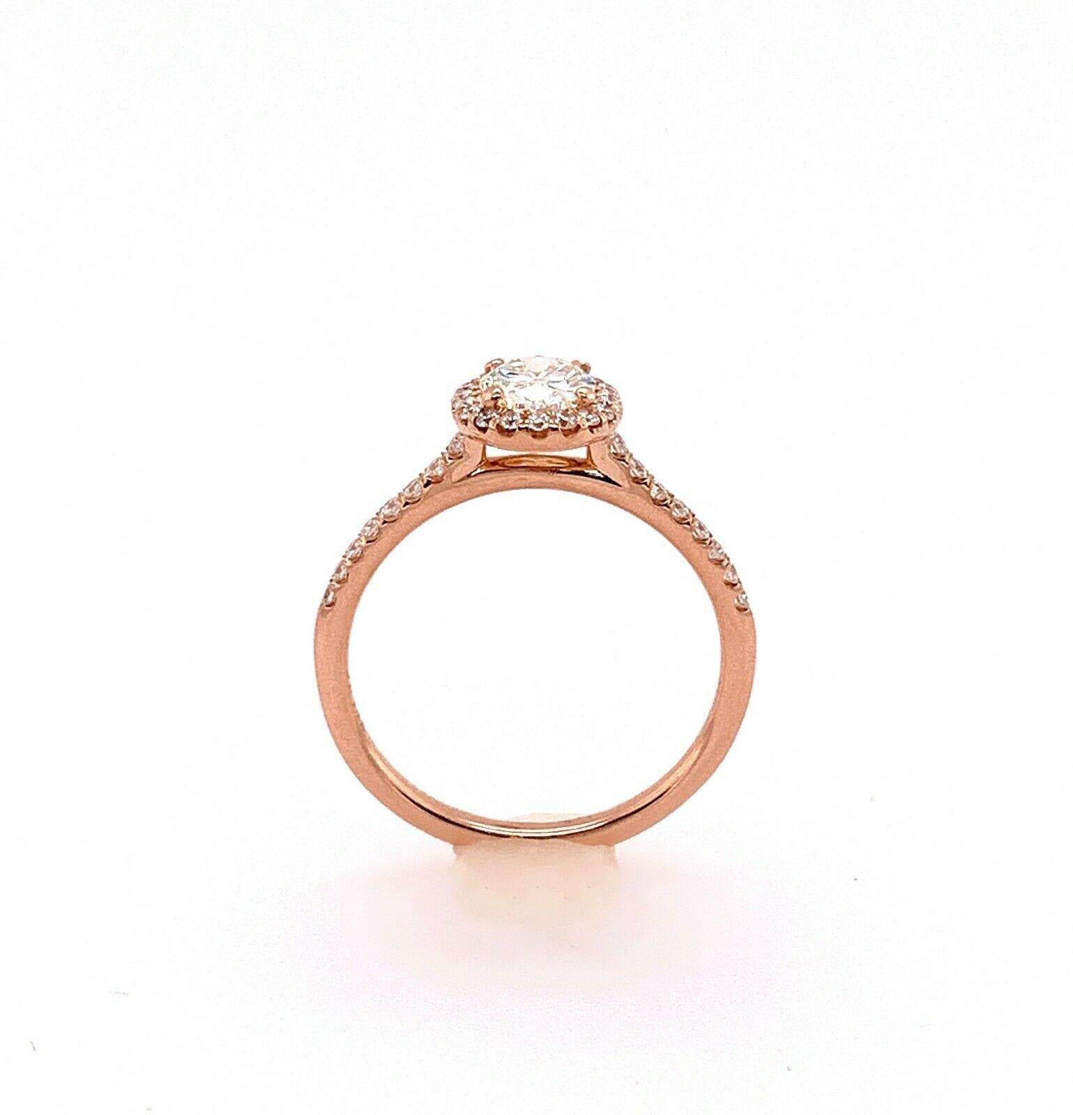 rose gold oval halo engagement rings