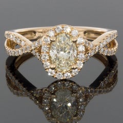 Rose Gold Oval Diamond Twisted Shank Halo Engagement Ring
