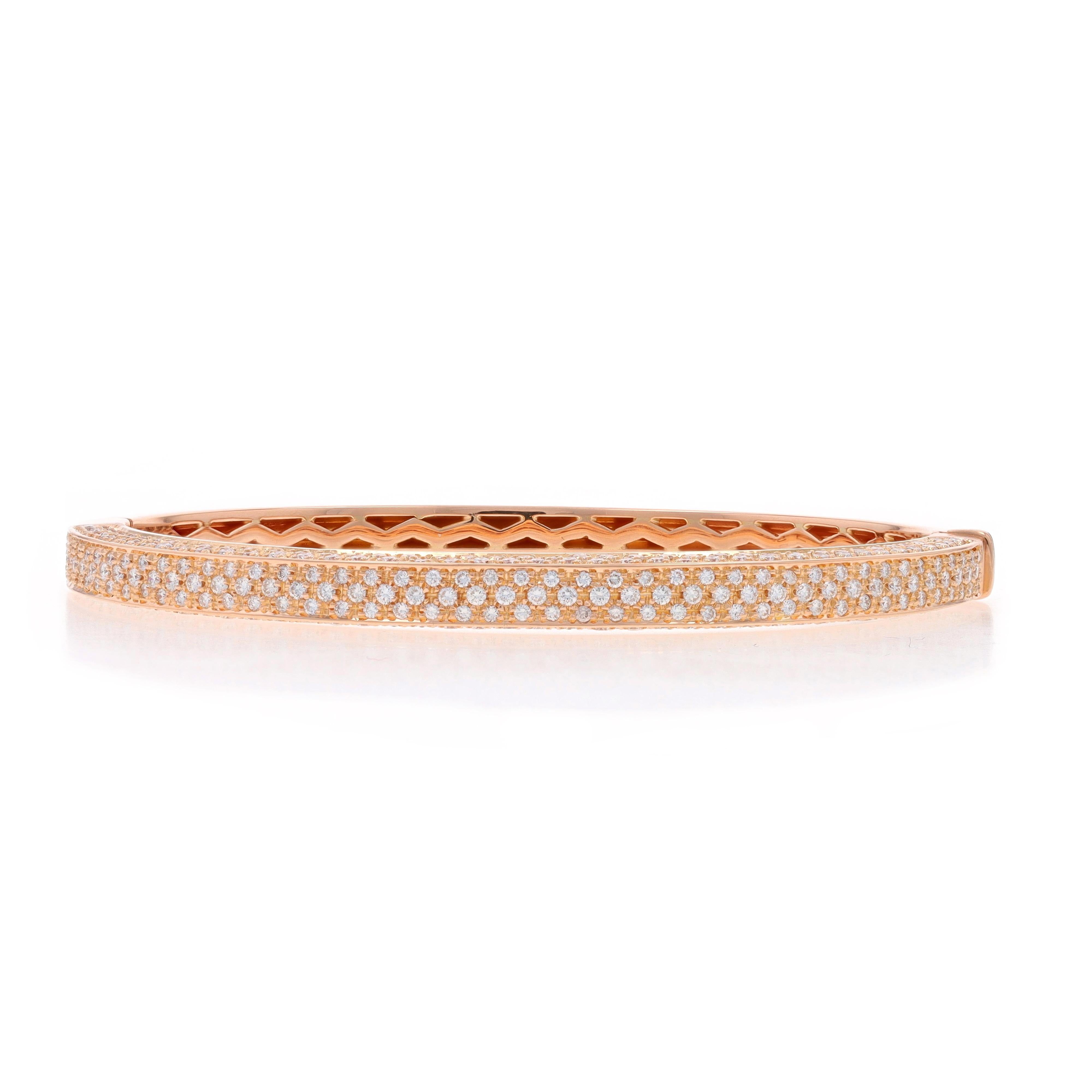Metal Content: 18k Rose Gold

Stone Information

Natural Diamonds
Carat(s): 3.78ctw
Cut: Round Brilliant
Color: F - G
Clarity: VS1 - VS2

Total Carats: 3.78ctw

Style: Oval Bangle
Fastening Type: Tab Box Clasp
Features: Pavé Set