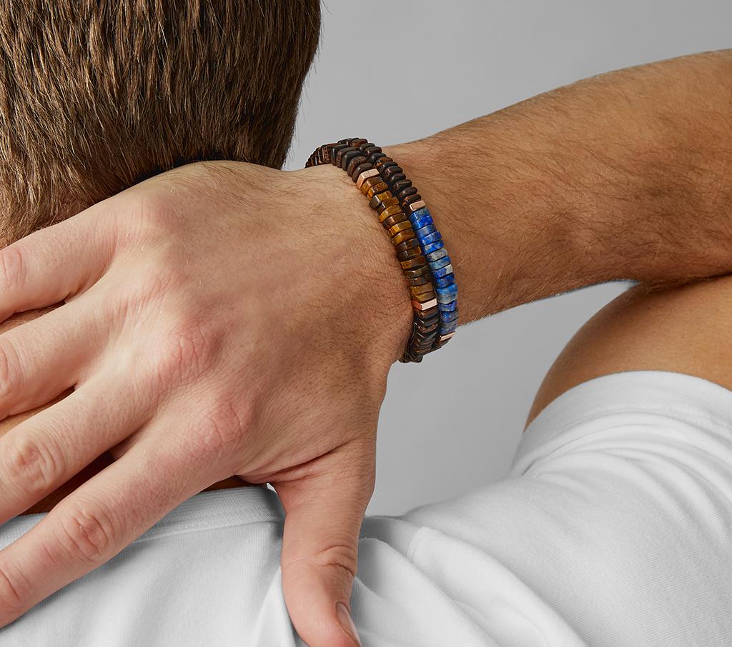 Rose gold plated, Lapis, Beaded Bracelet  - This slip-on bracelet features a variety of square discs to create a unique form. Ebony and palm wood beads are accented by rose gold discs with the front of each bracelet featuring either Lapis or Tiger