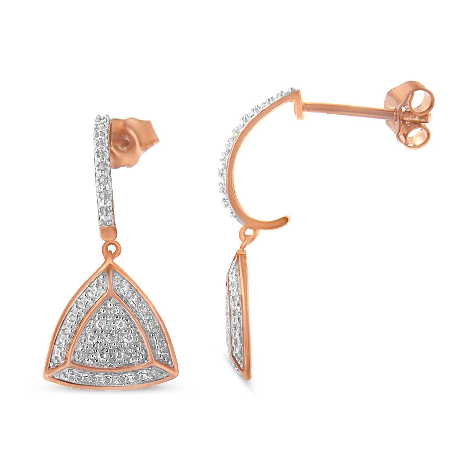Win her heart by presenting these lovely dangle earrings. It is composed of sterling silver and plated with rose gold for extra appeal. Fashioned in the triangle shape, the pair of earrings is encrusted with shimmering round cut diamonds. All the