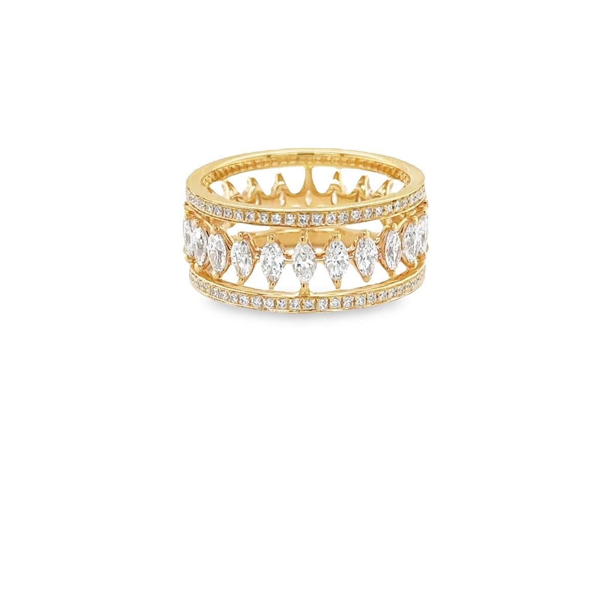 Presenting the ANNIVERSARY Ring, crafted in 18Kt yellow gold with a weight of 4.98 grams. This ring features striking Marquise Diamonds with G color and VS clarity, totaling 1.37 carats, along with additional Diamonds of G color and VS clarity,
