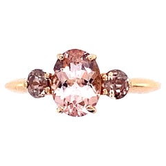 Rose Gold Ring Surmounted by a Morganite and Surrounded by Two Tourmalines